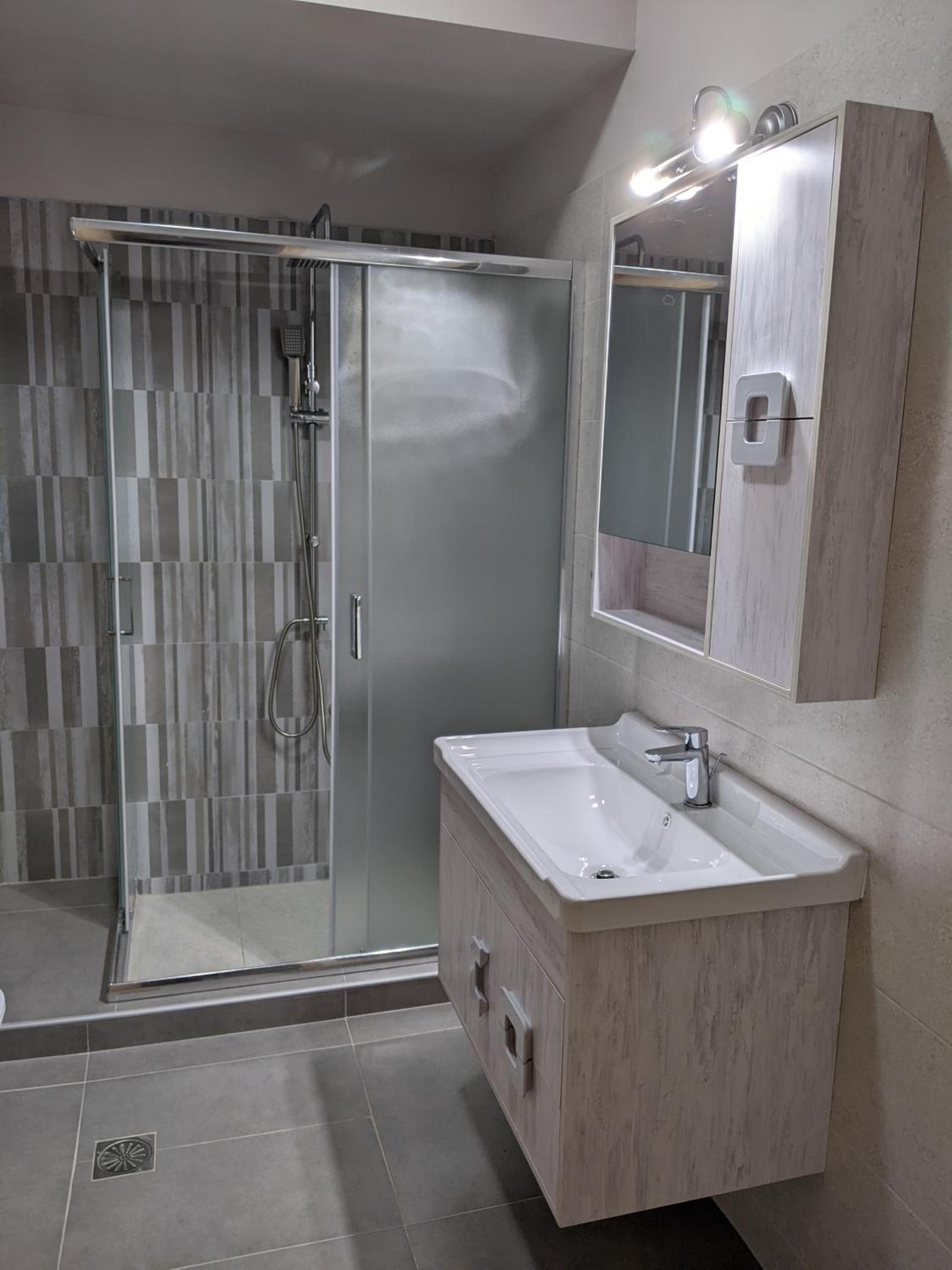 Three-Bedroom Apartment with View - Photo 18