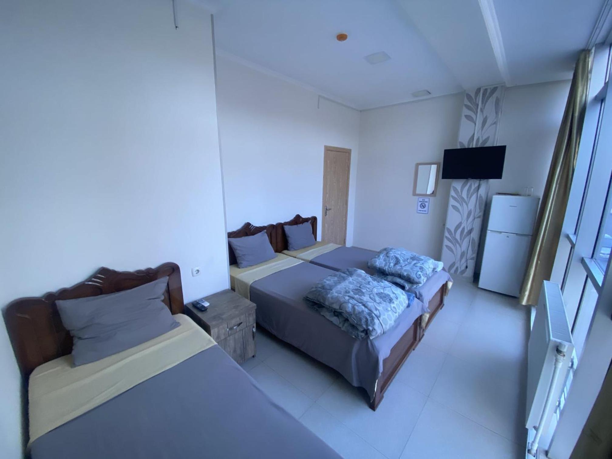 Triple Room With Shared Bathroom