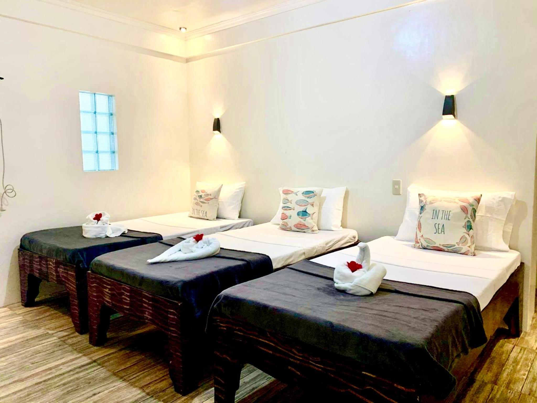 Deluxe Triple Room - Photo 1