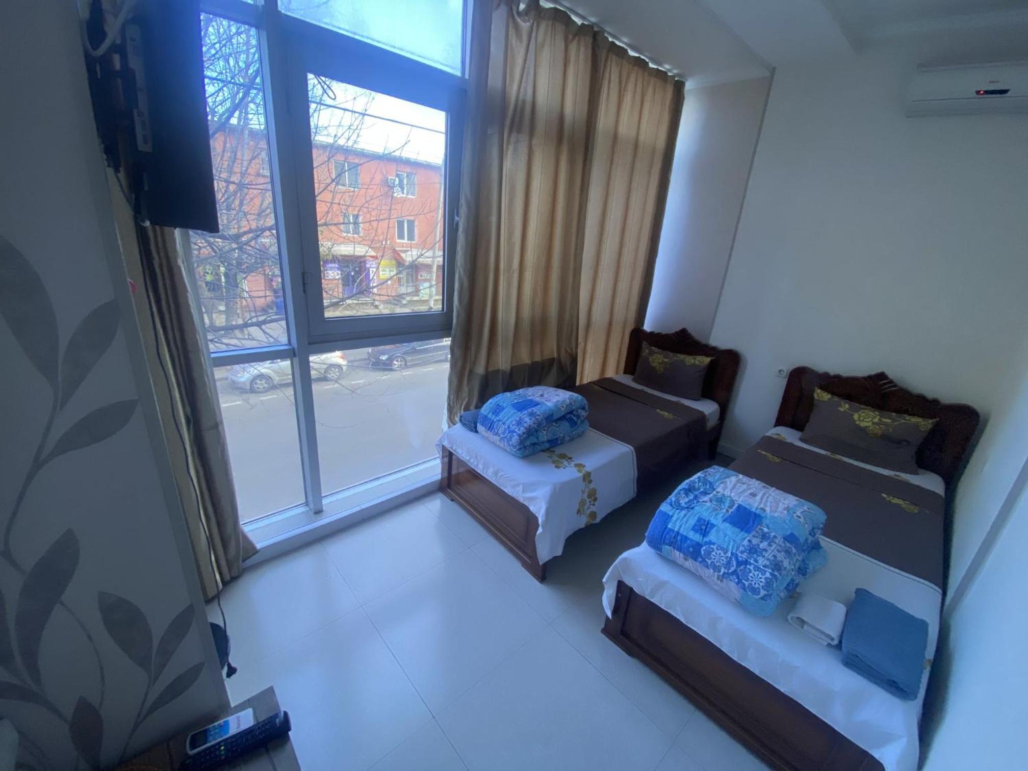 Twin Room With Shared Bathroom