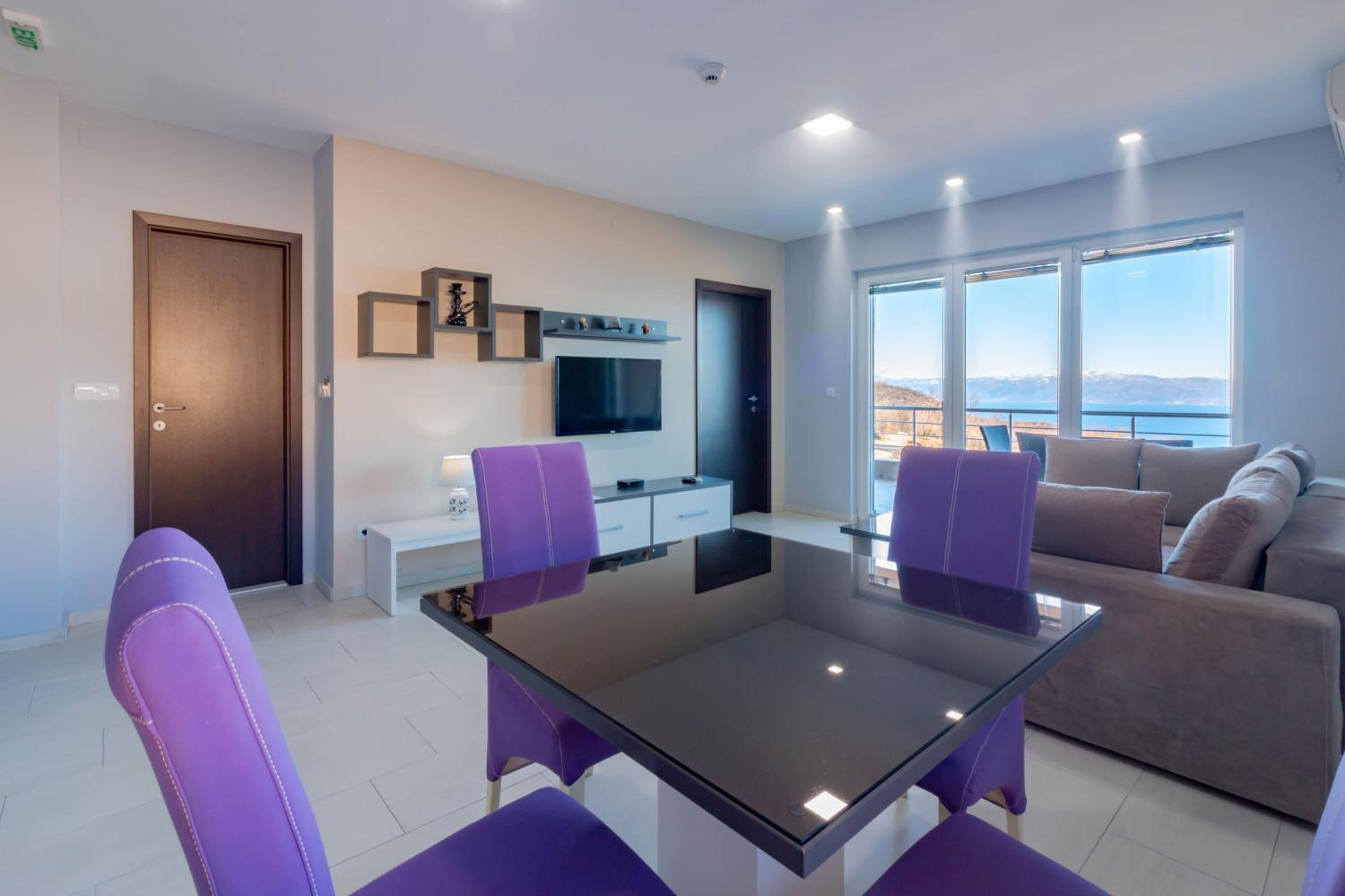 Deluxe Two-Bedroom Apartment with Balcony and Lake View - Photo 1