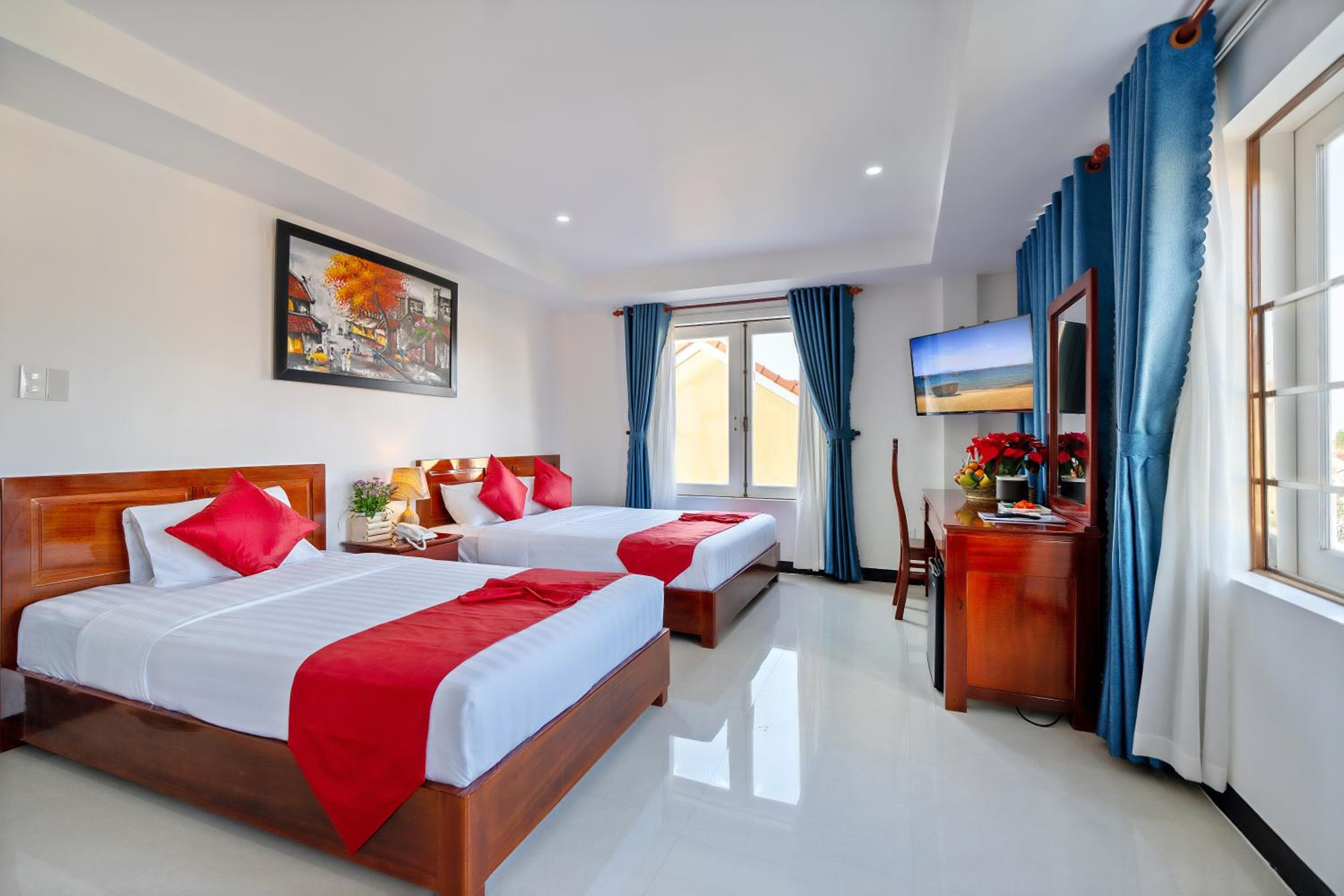 Deluxe Triple Room - Photo 1