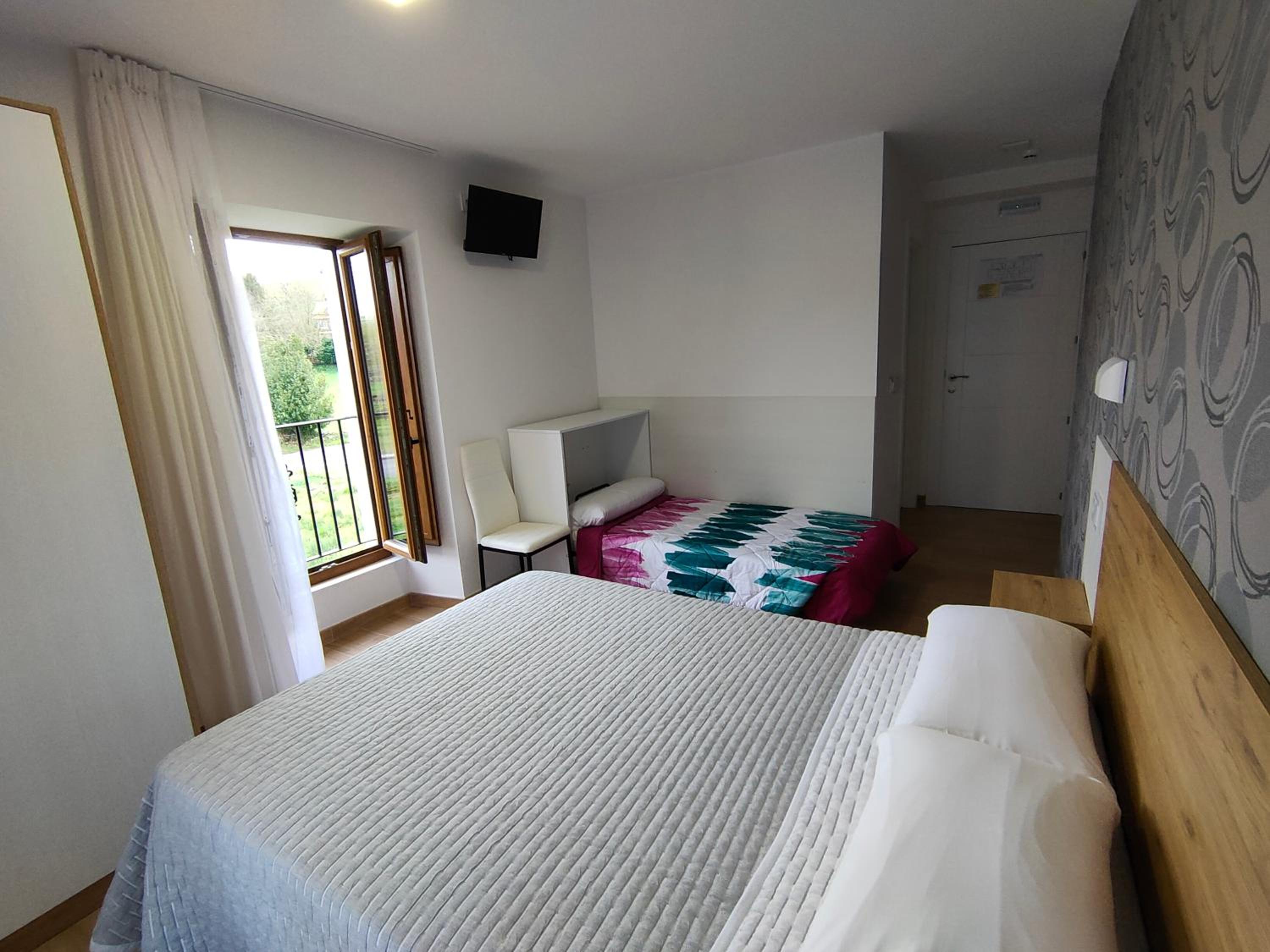 Habitación Doble con Cama Supletoria