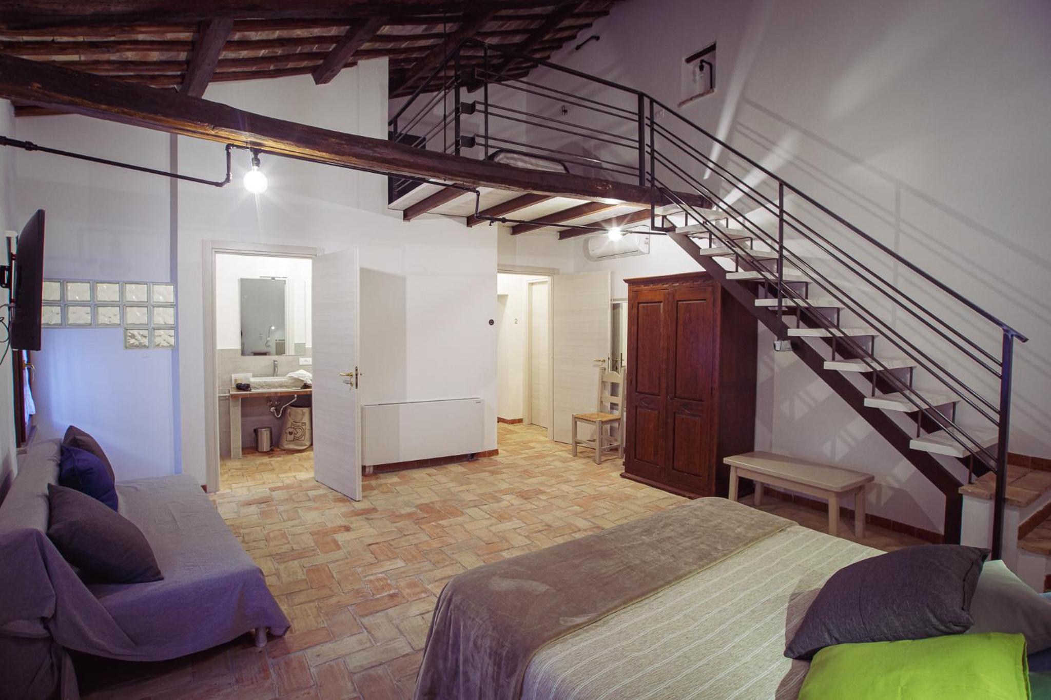 Quadruple Room with Private Bathroom photo 1