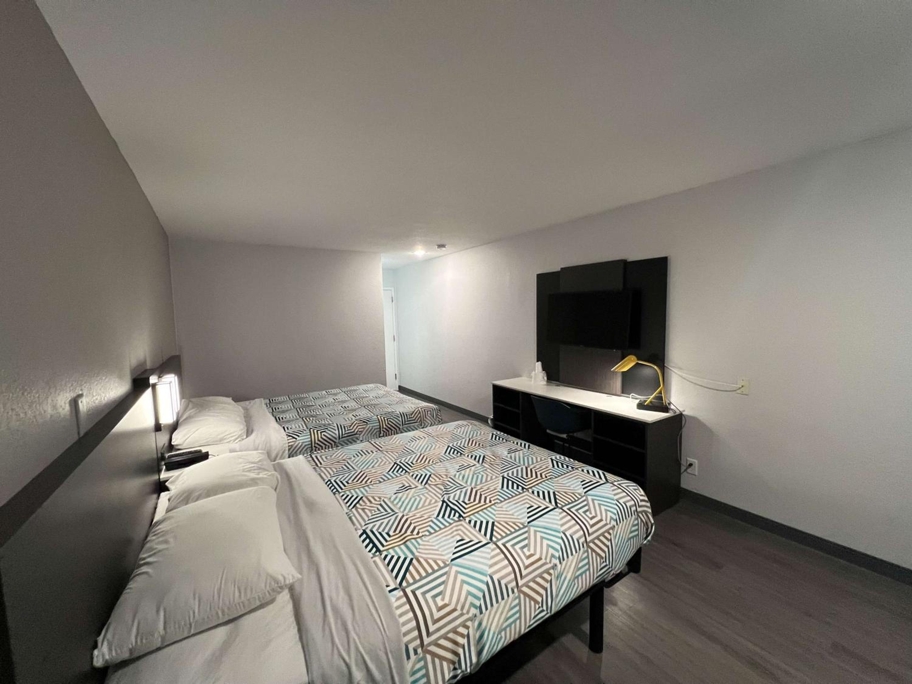 Deluxe Queen Room with Two Queen Beds - Non-Smoking photo 1