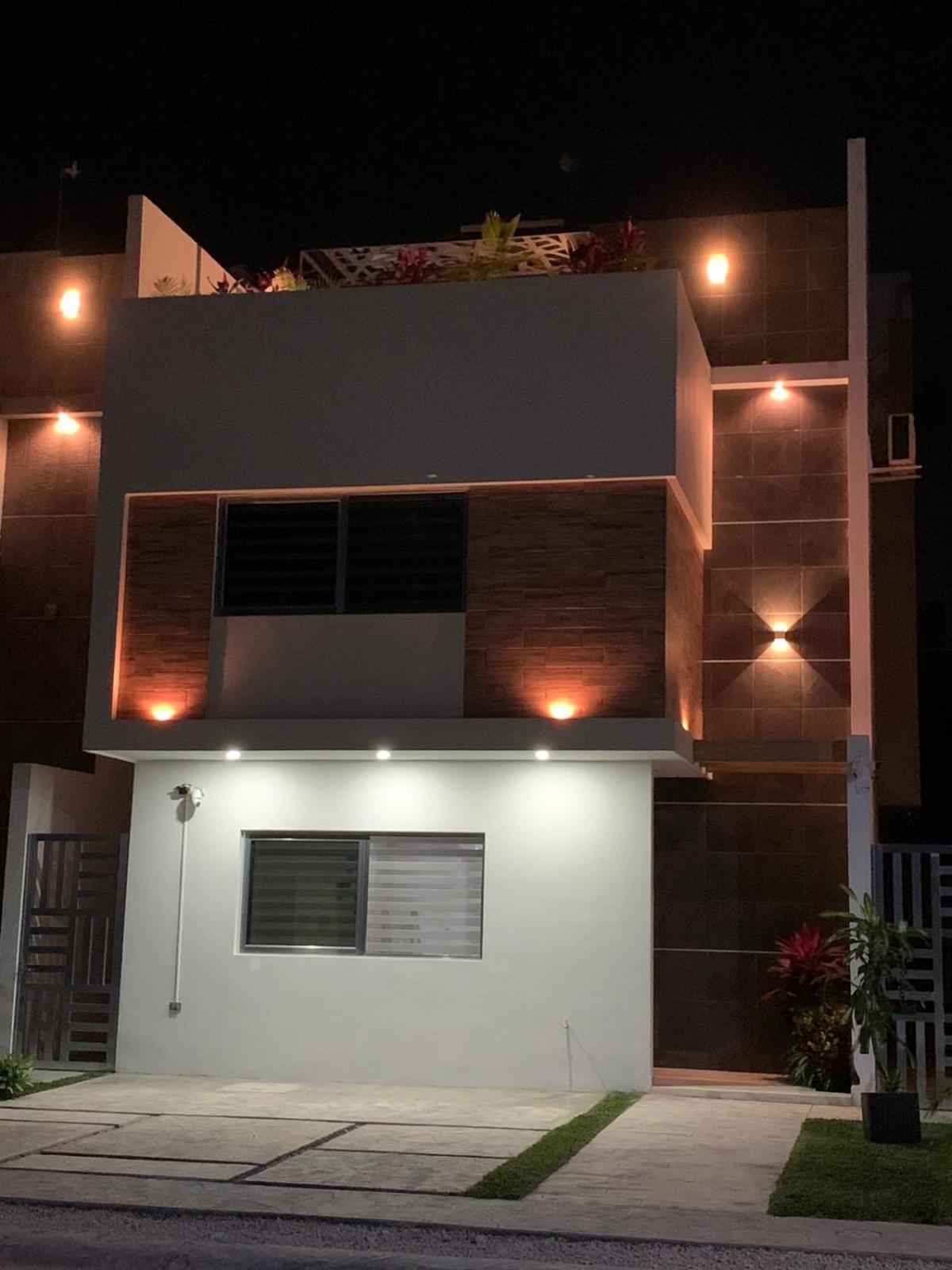 Three-Bedroom House - Photo 38