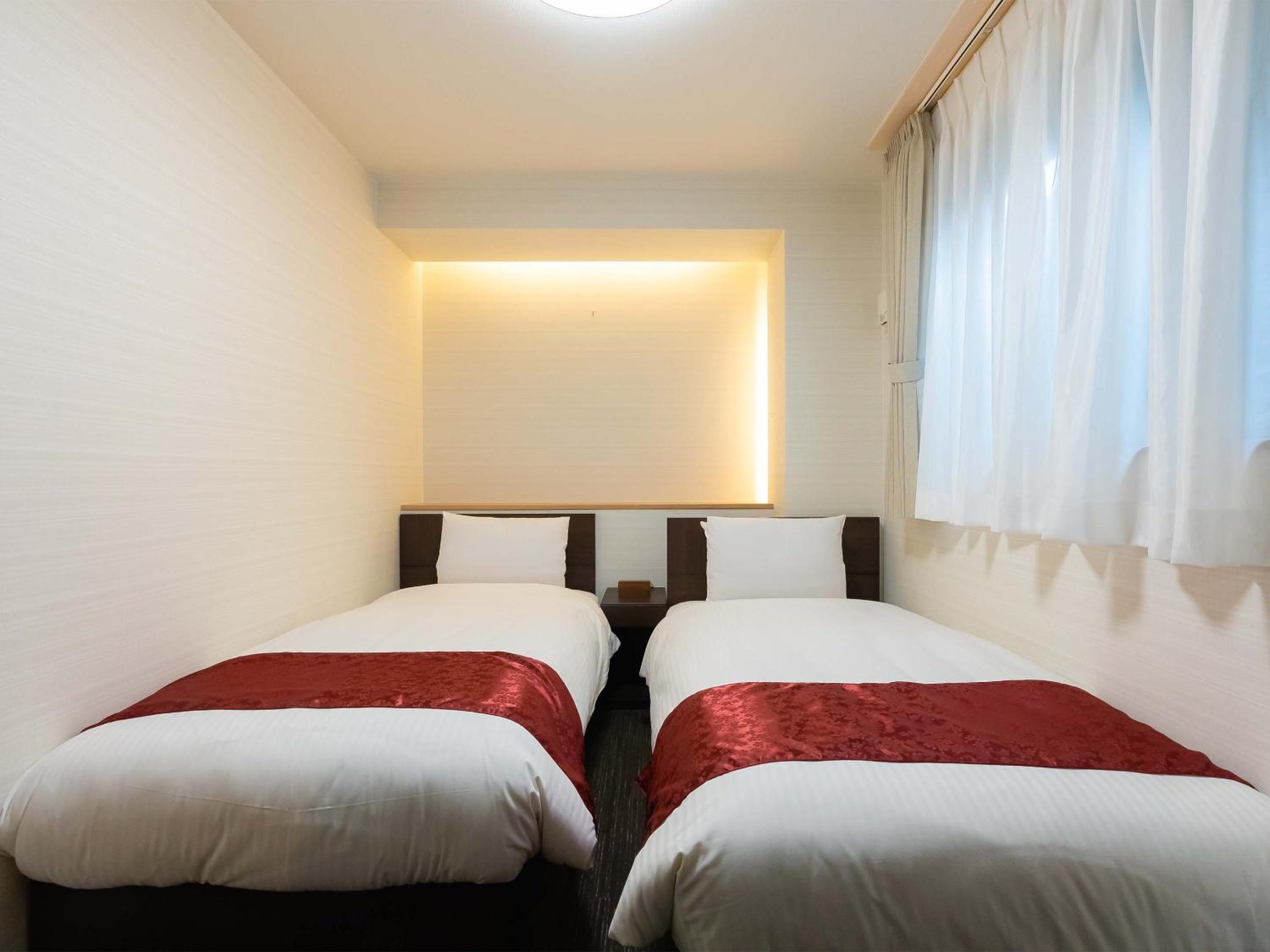 Twin Room - Photo 6