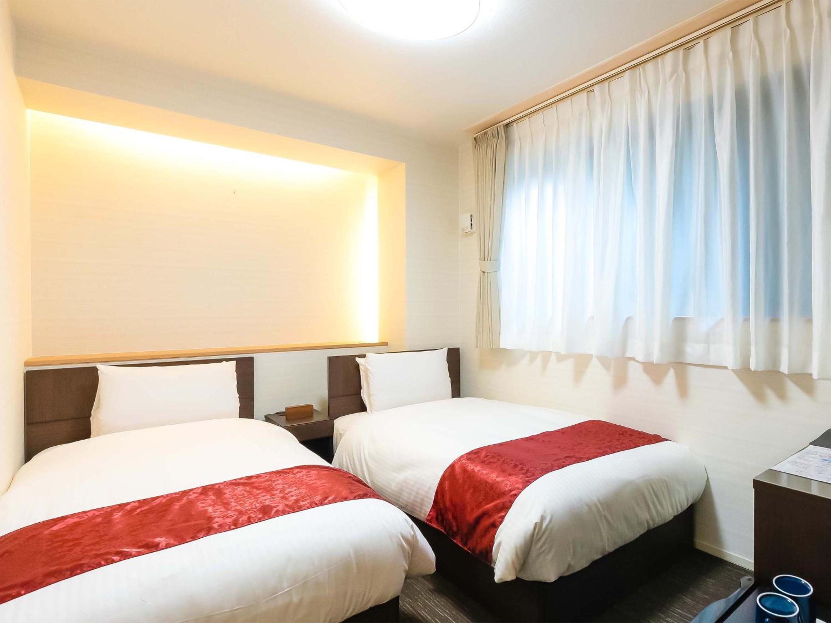 Twin Room - Photo 7