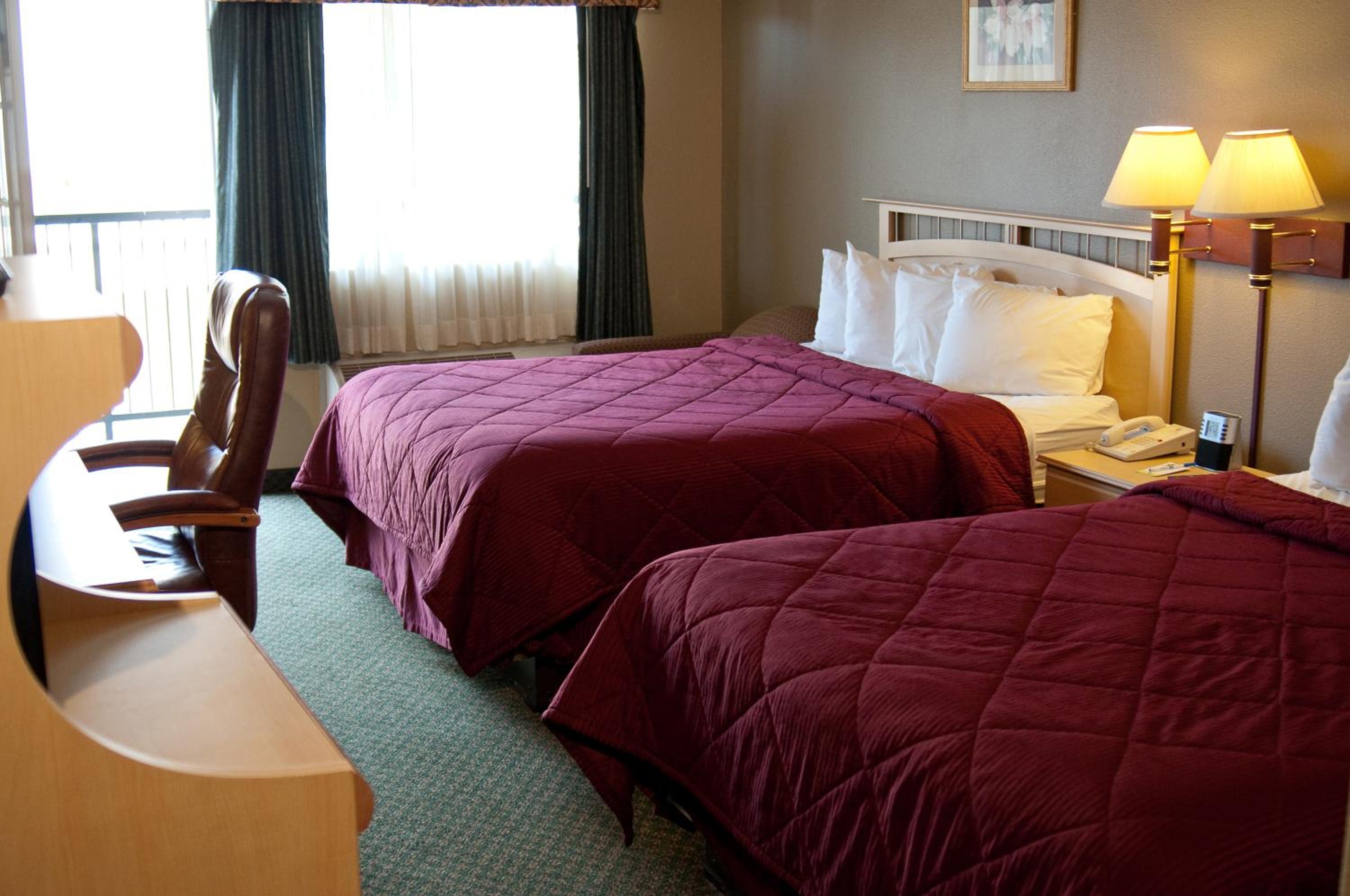 Deluxe Queen Room with Two Queen Beds with Balcony - Photo 4