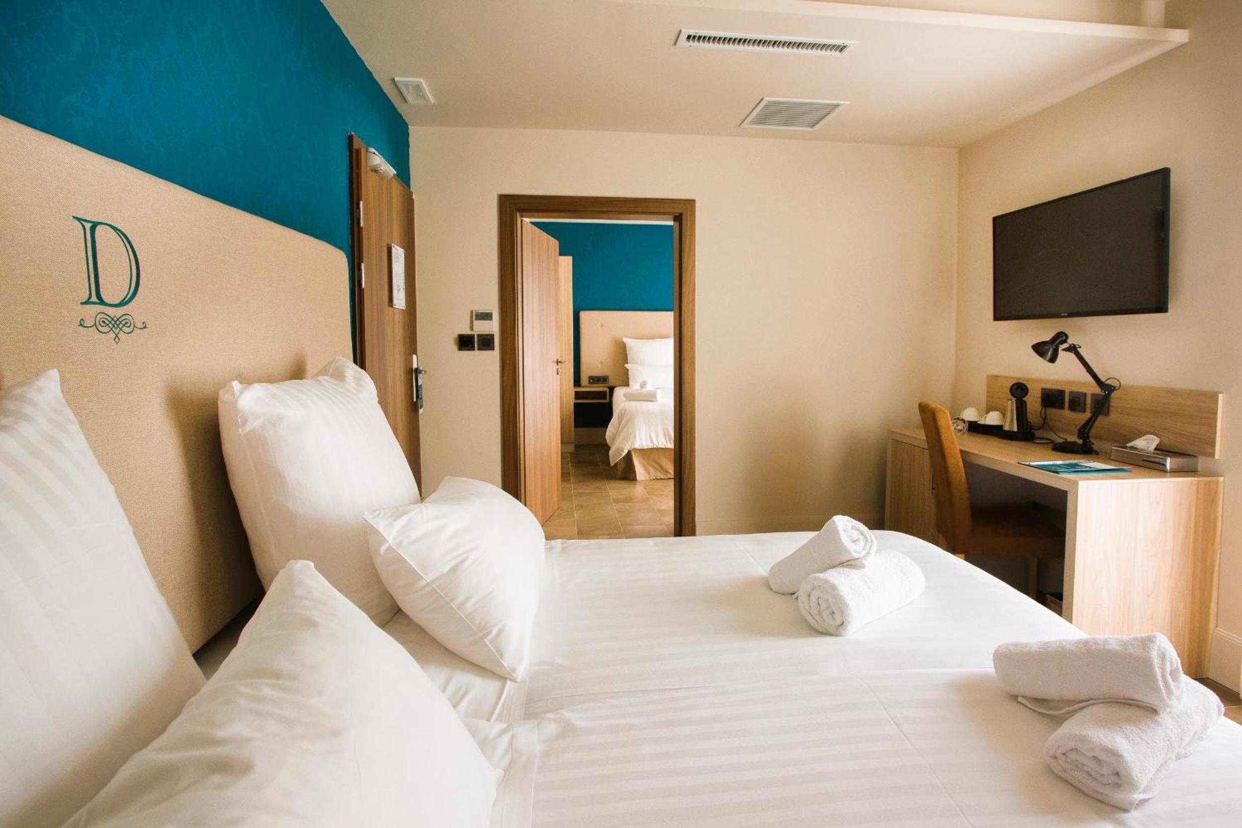 Deluxe Vierbettzimmer mit Balkon