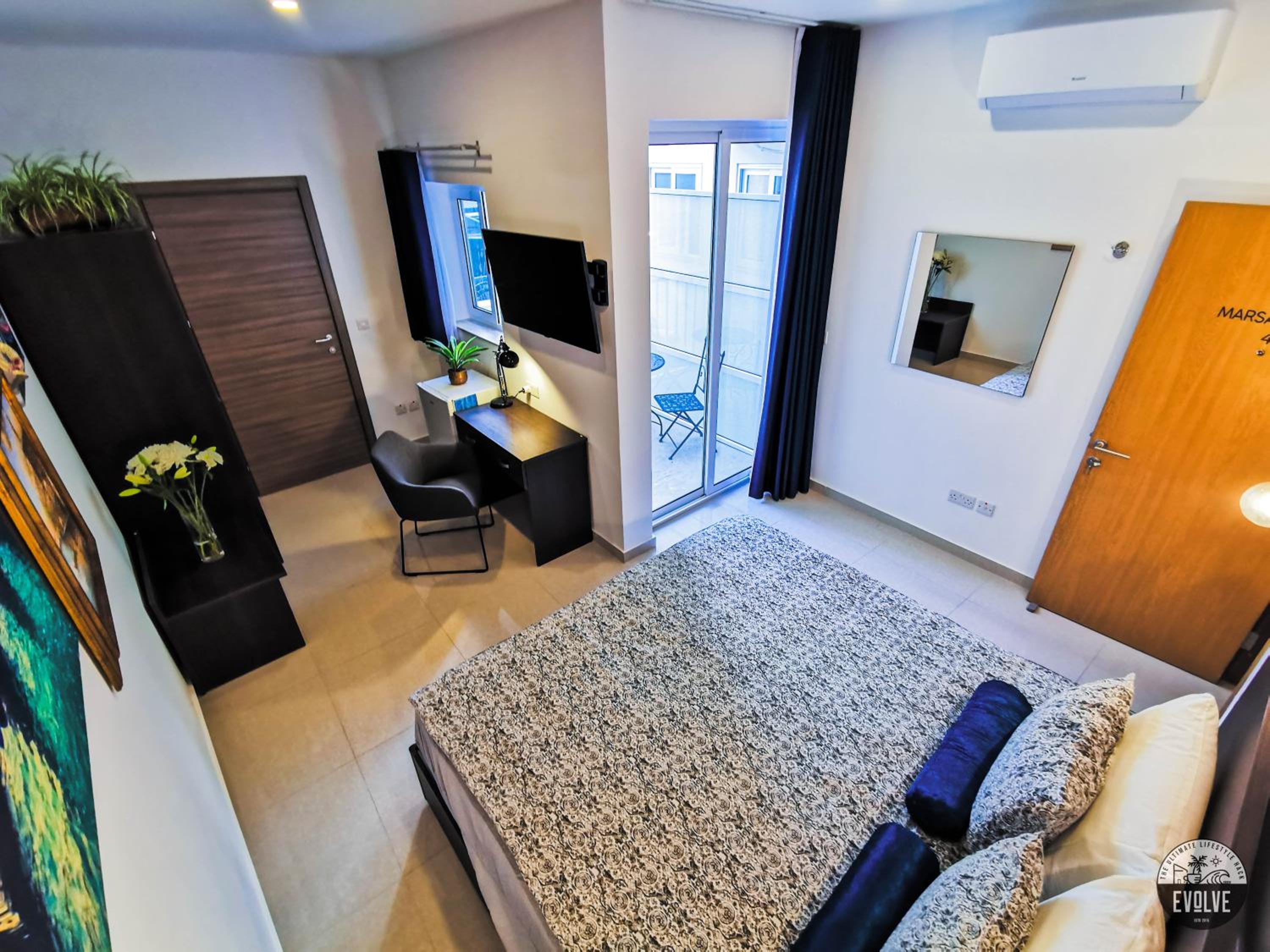 Habitación King con Balcón