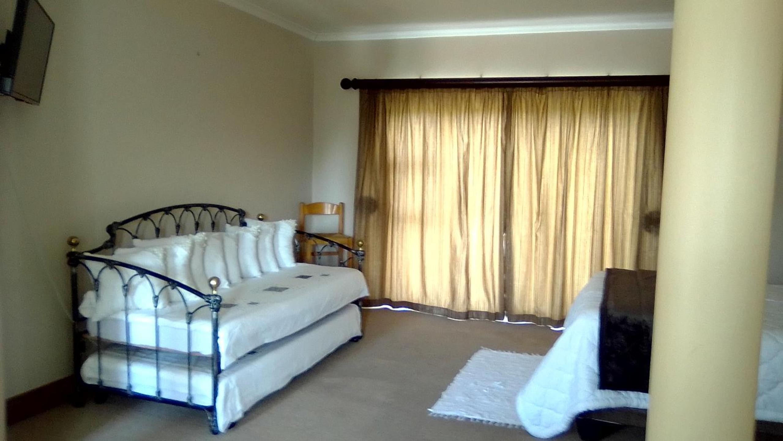 Family Room with Balcony - Photo 2