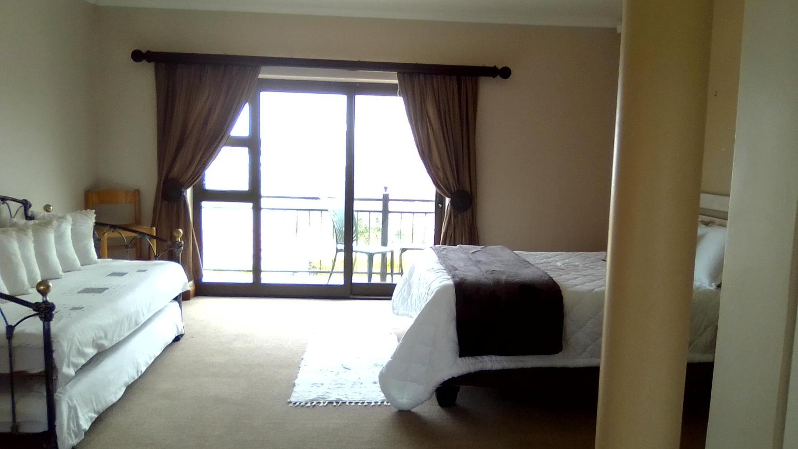 Family Room with Balcony - Photo 7