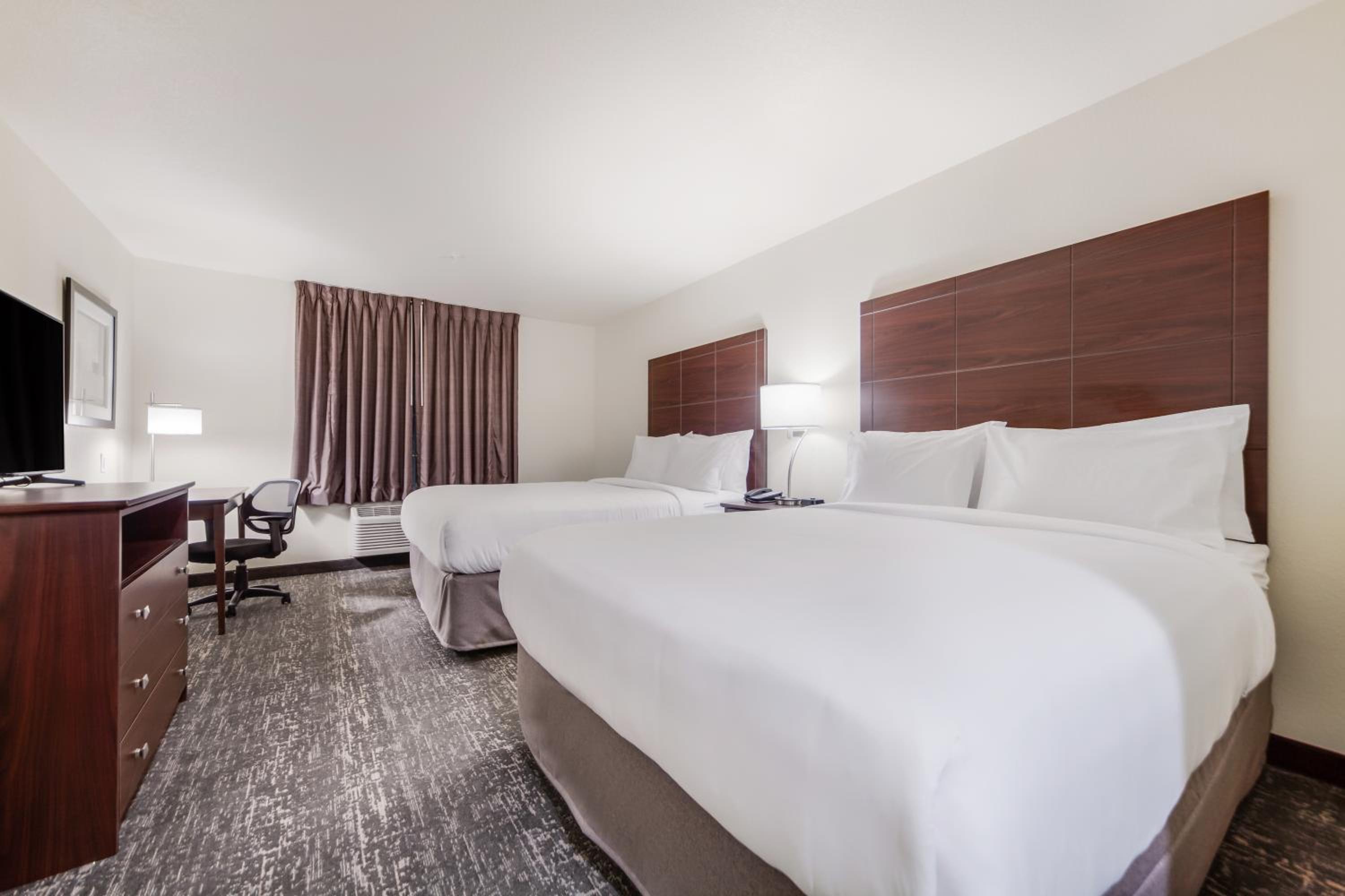 Standard Queen Room with Two Queen Beds - Photo 1
