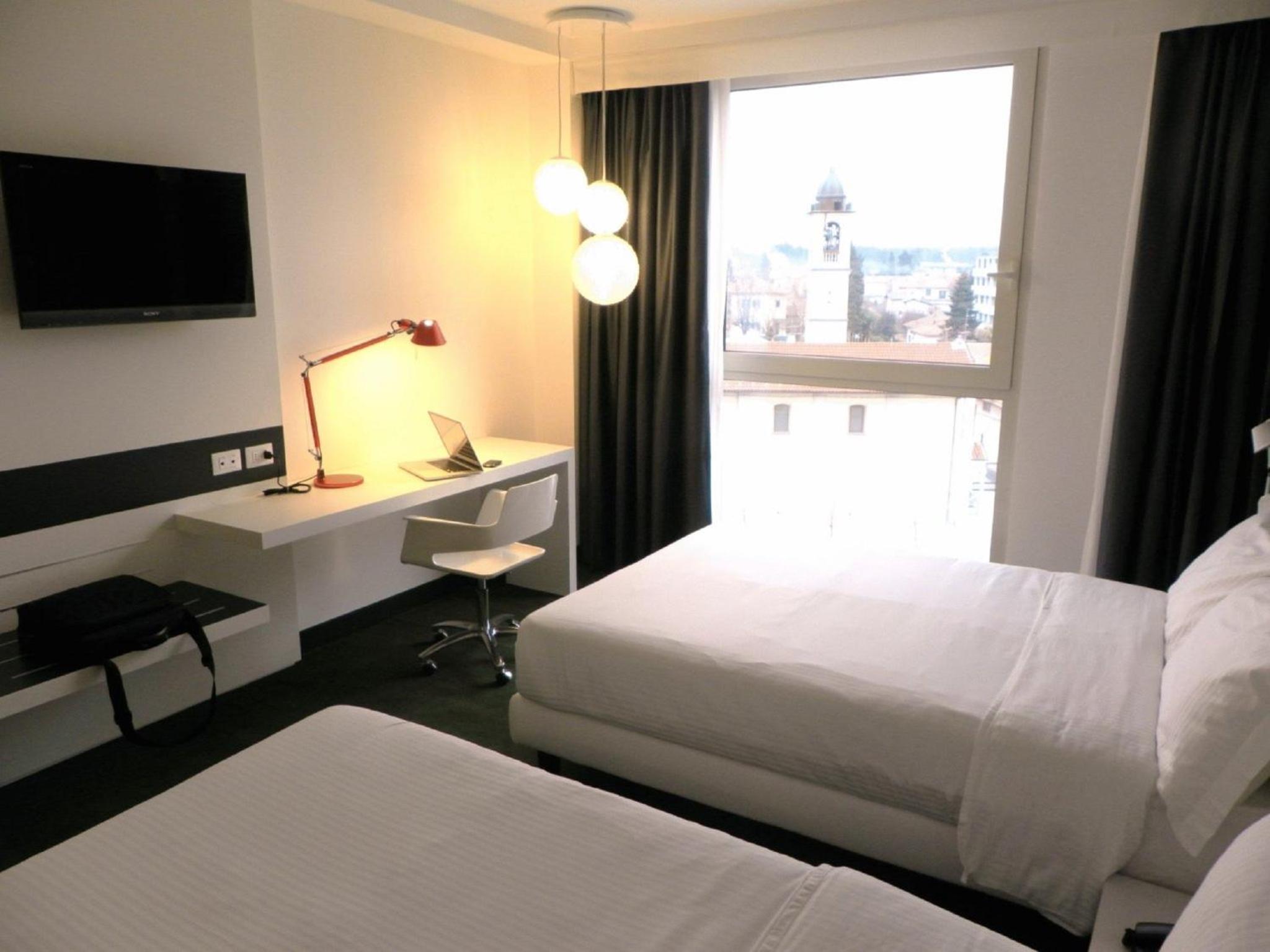 Twin Room with Two Double Beds photo 1