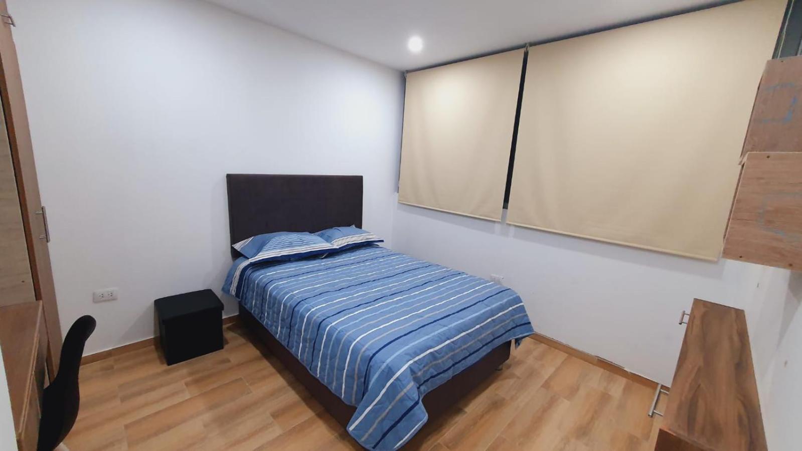 Three-Bedroom Apartment photo 1