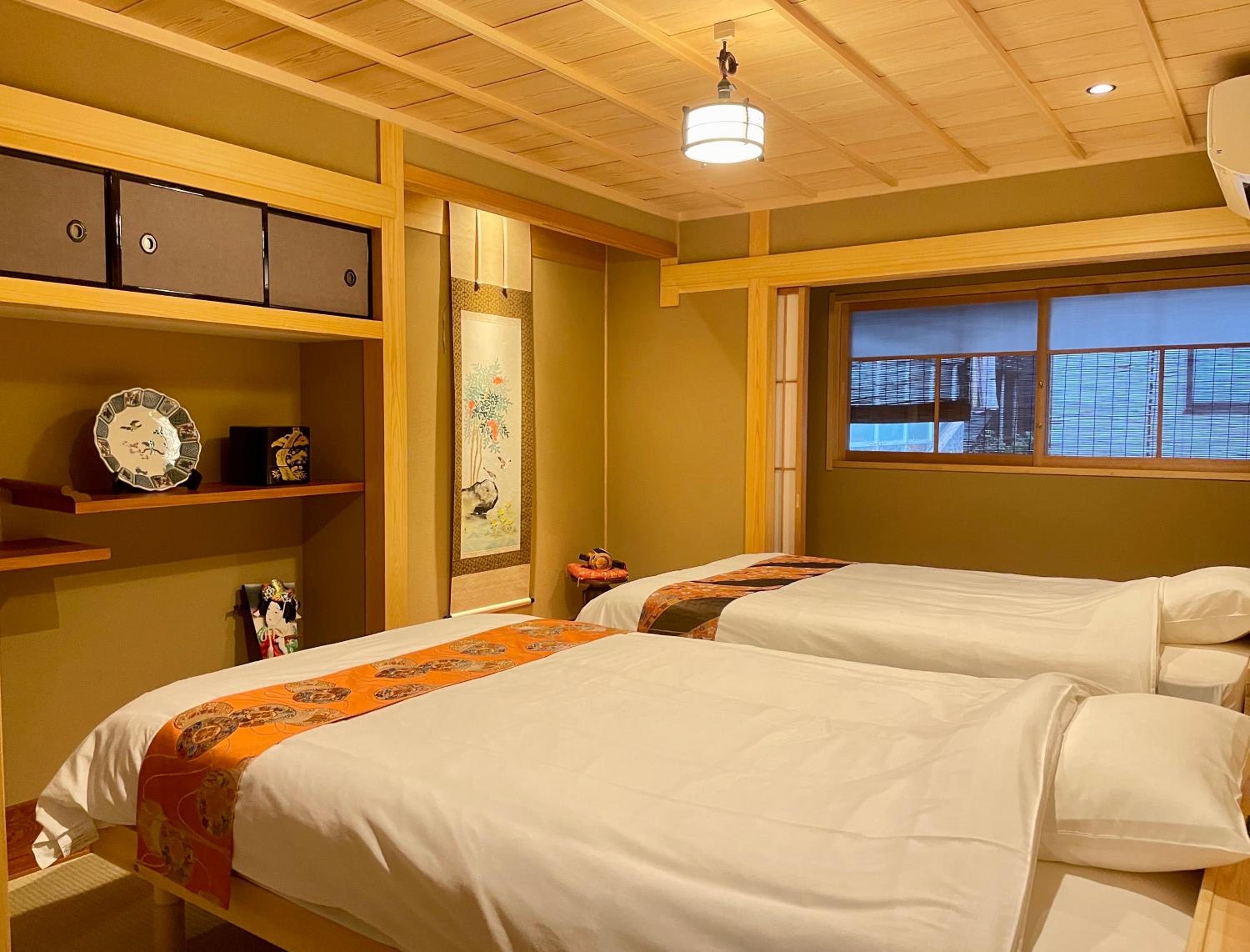 Three-Bedroom House - Photo 33