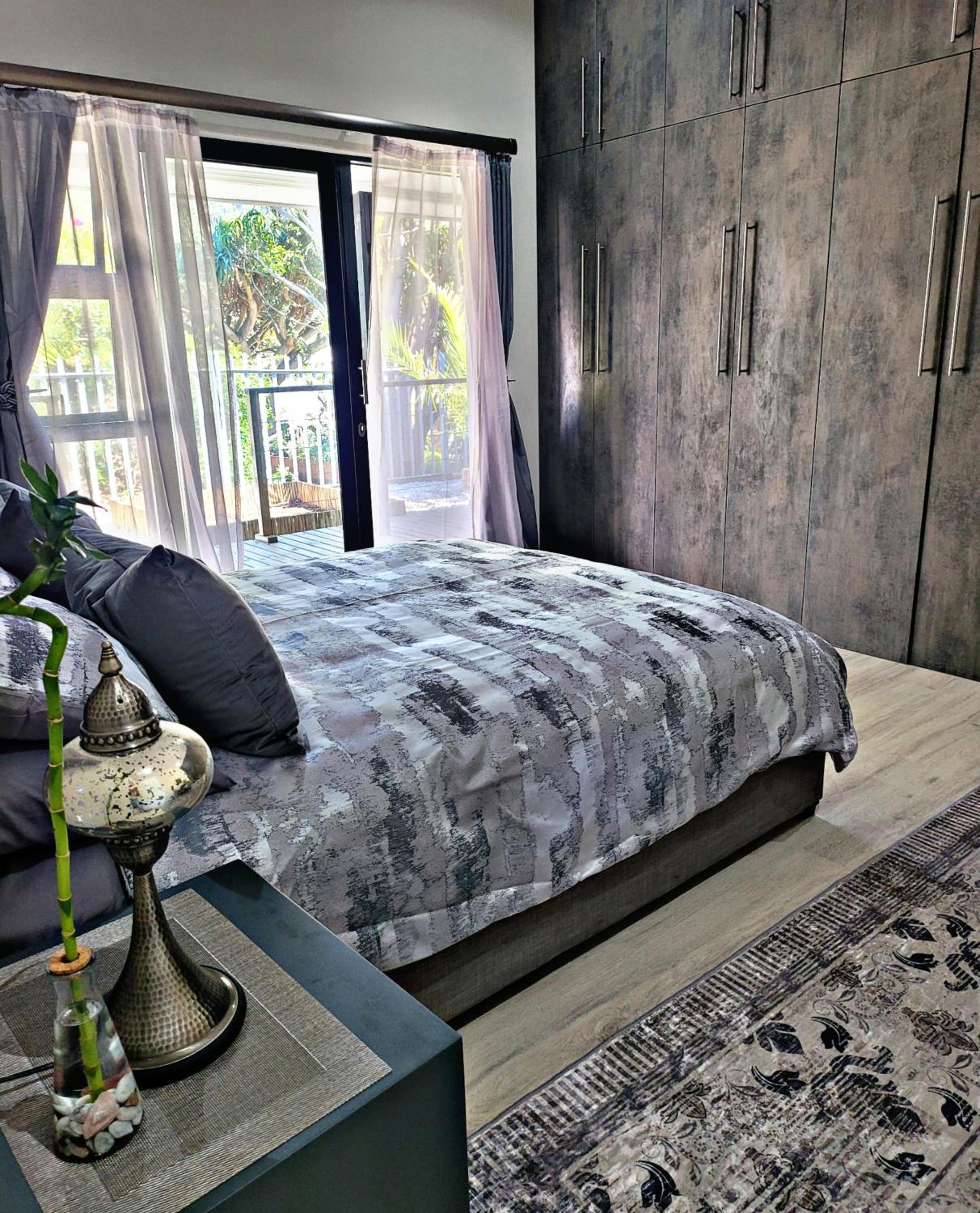 Four-Bedroom House - Photo 26
