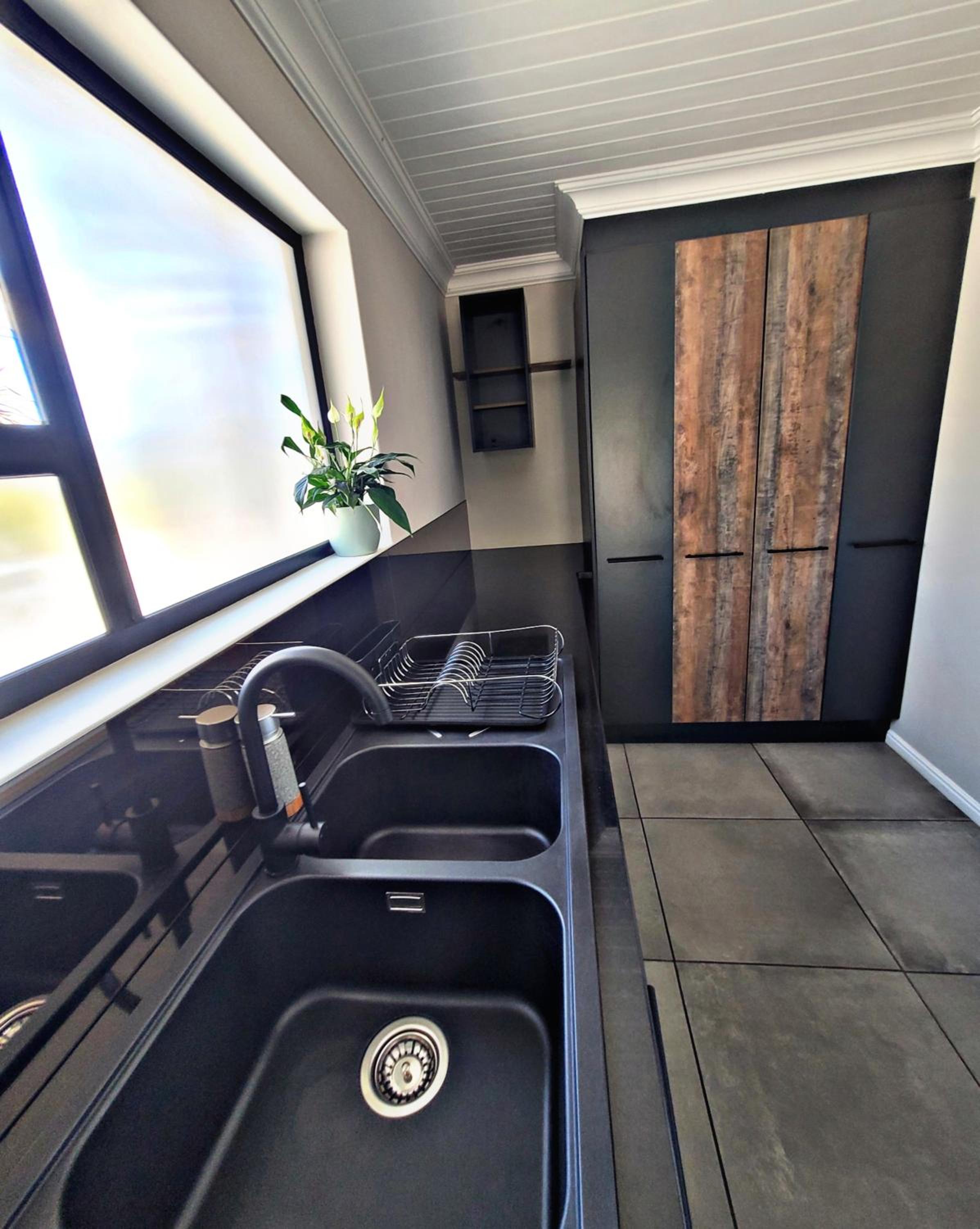 Four-Bedroom House - Photo 31