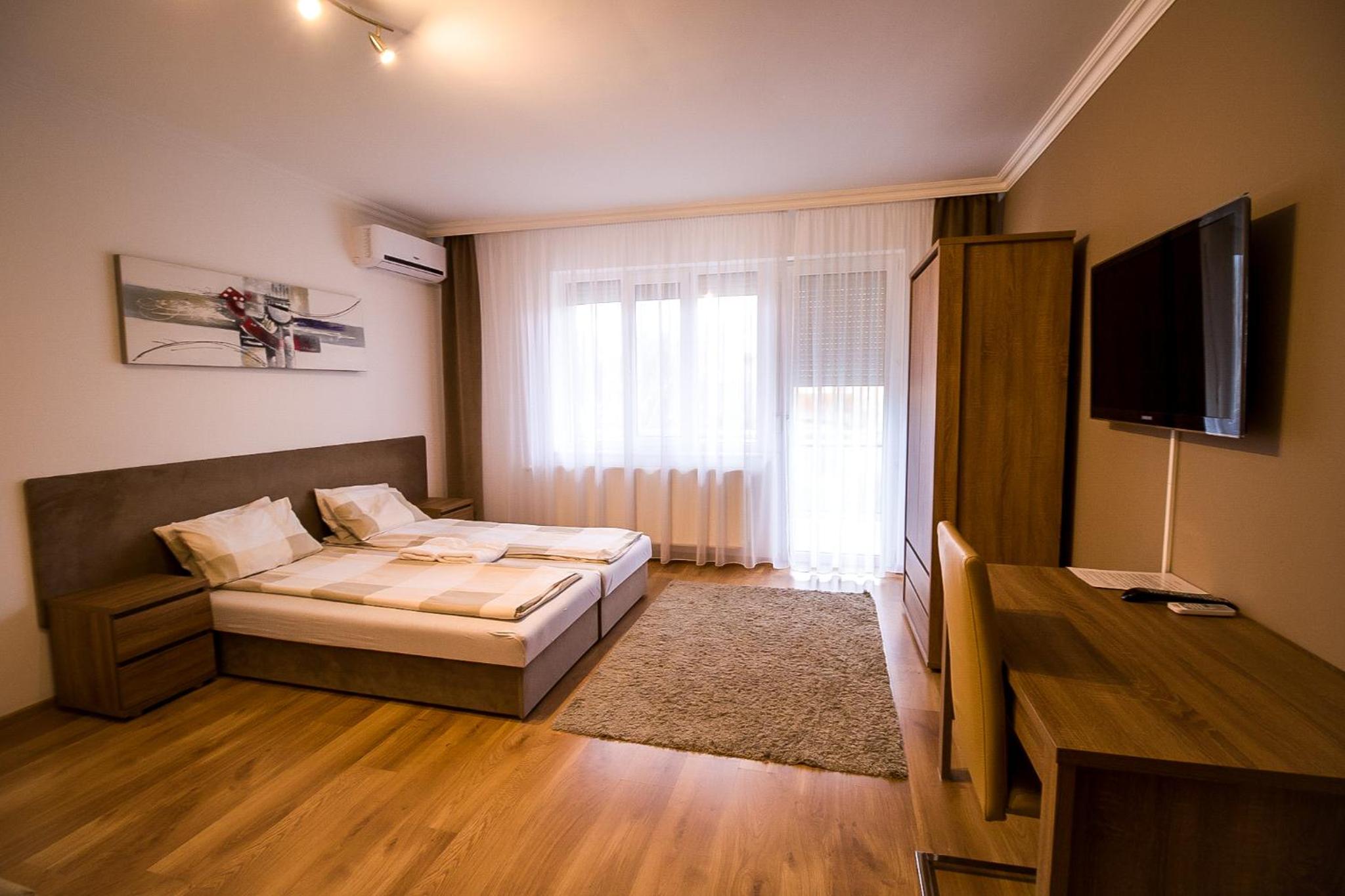 Three-Bedroom Apartment photo 1