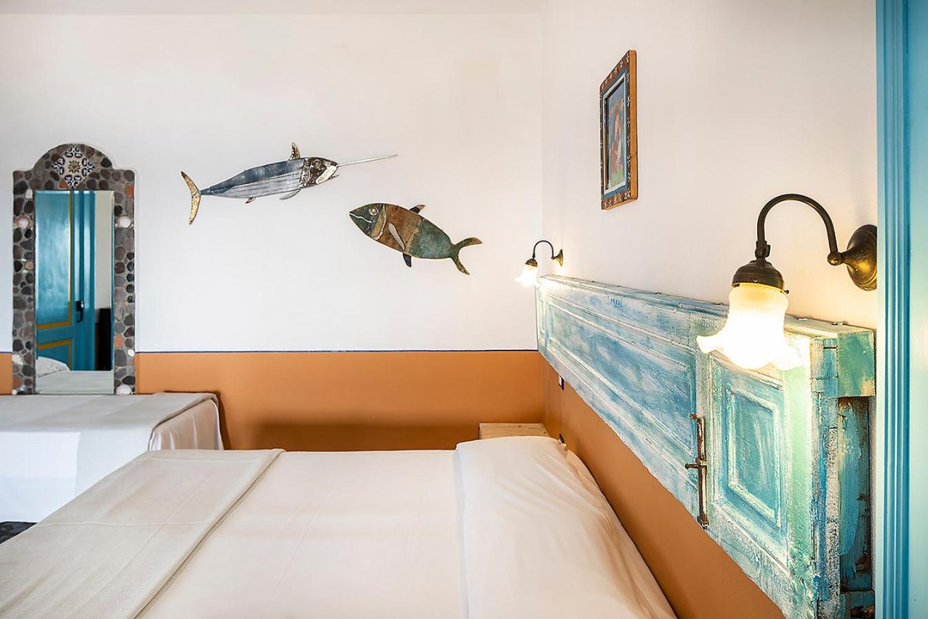 Deluxe Quadruple Room with Terrace and Sea View photo 3
