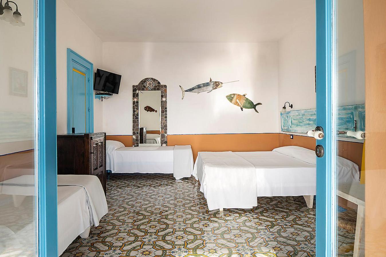 Deluxe Quadruple Room with Terrace and Sea View photo 1