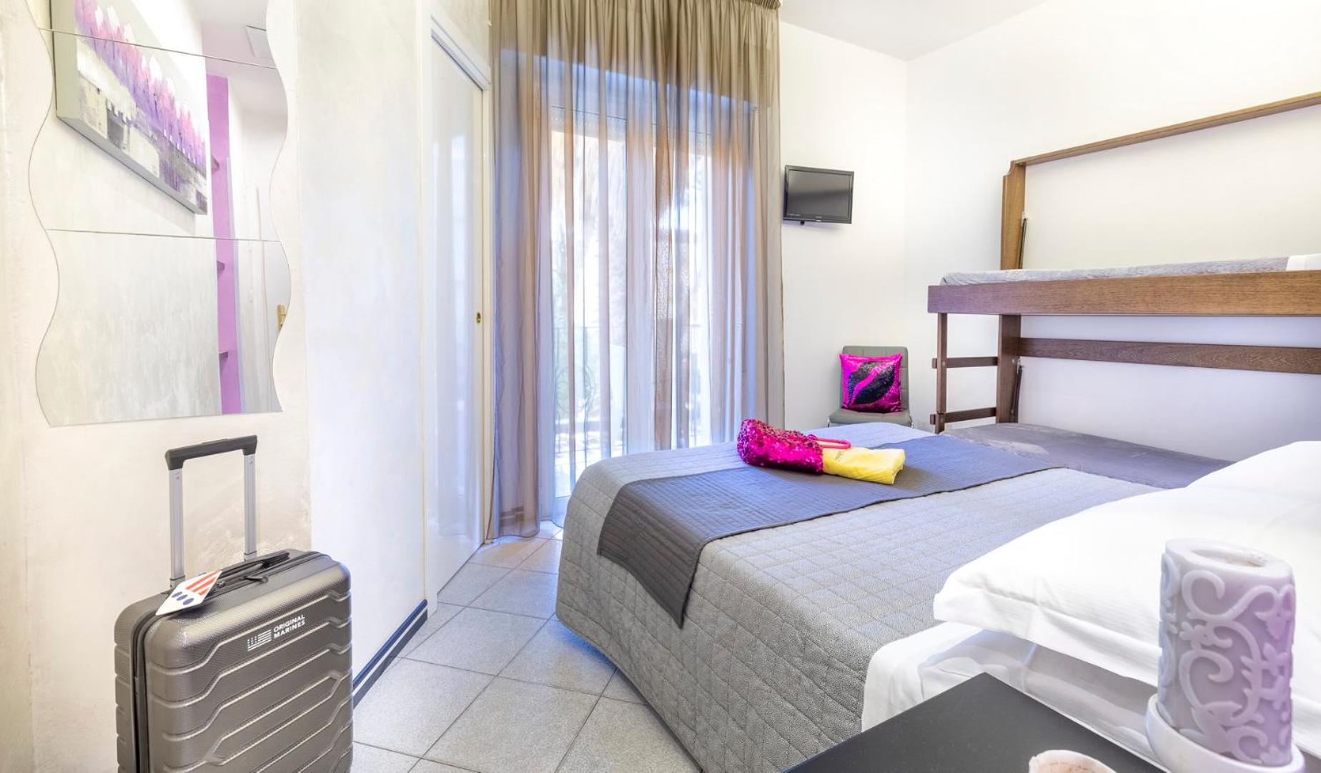 Quadruple Room - Photo 1