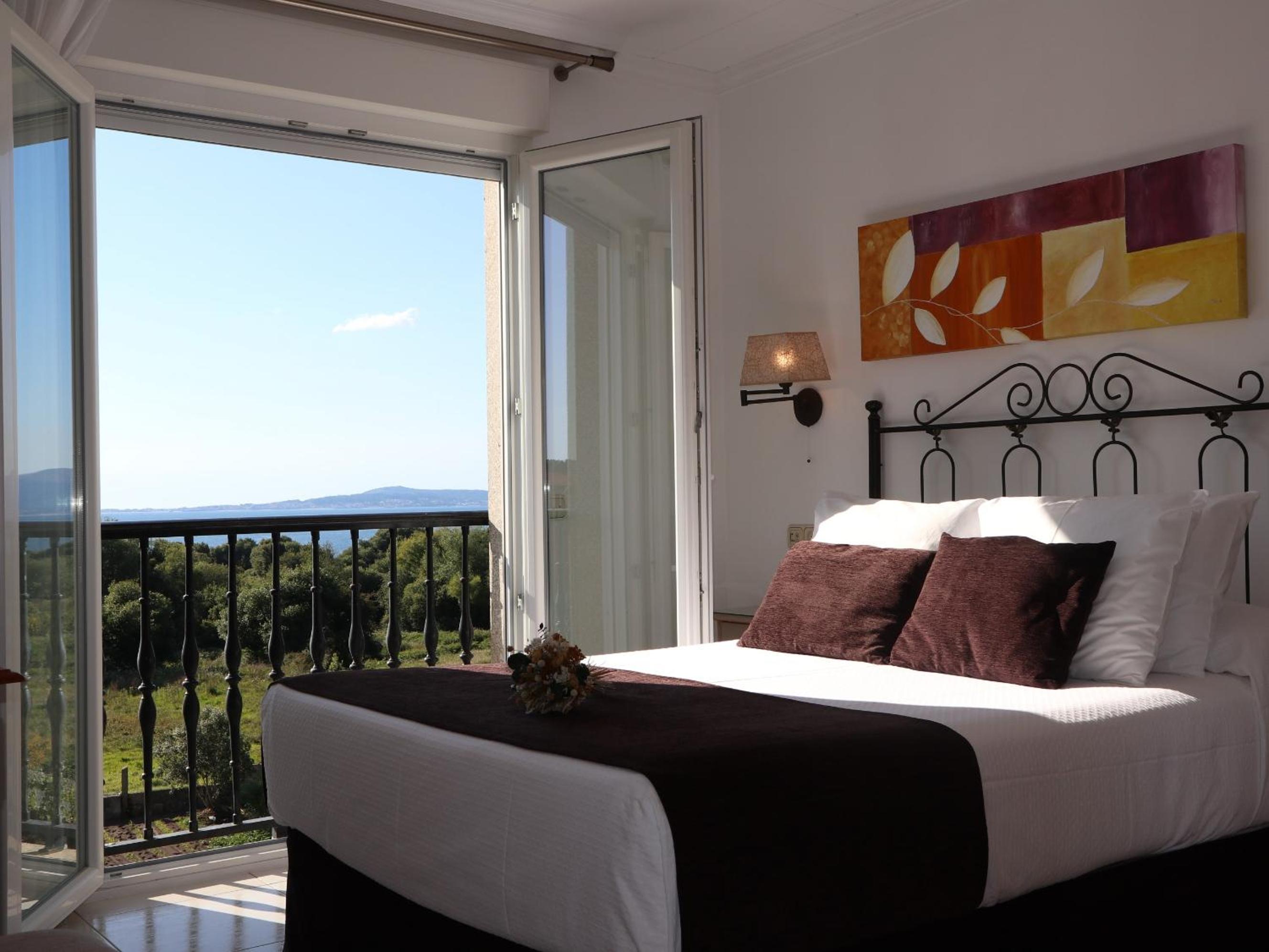 Habitación Doble Deluxe con Balcón y Vista al Mar