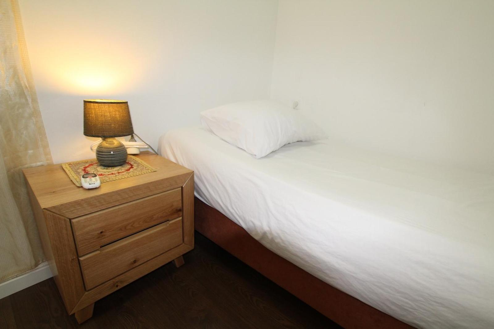 Three-Bedroom Apartment - Photo 10