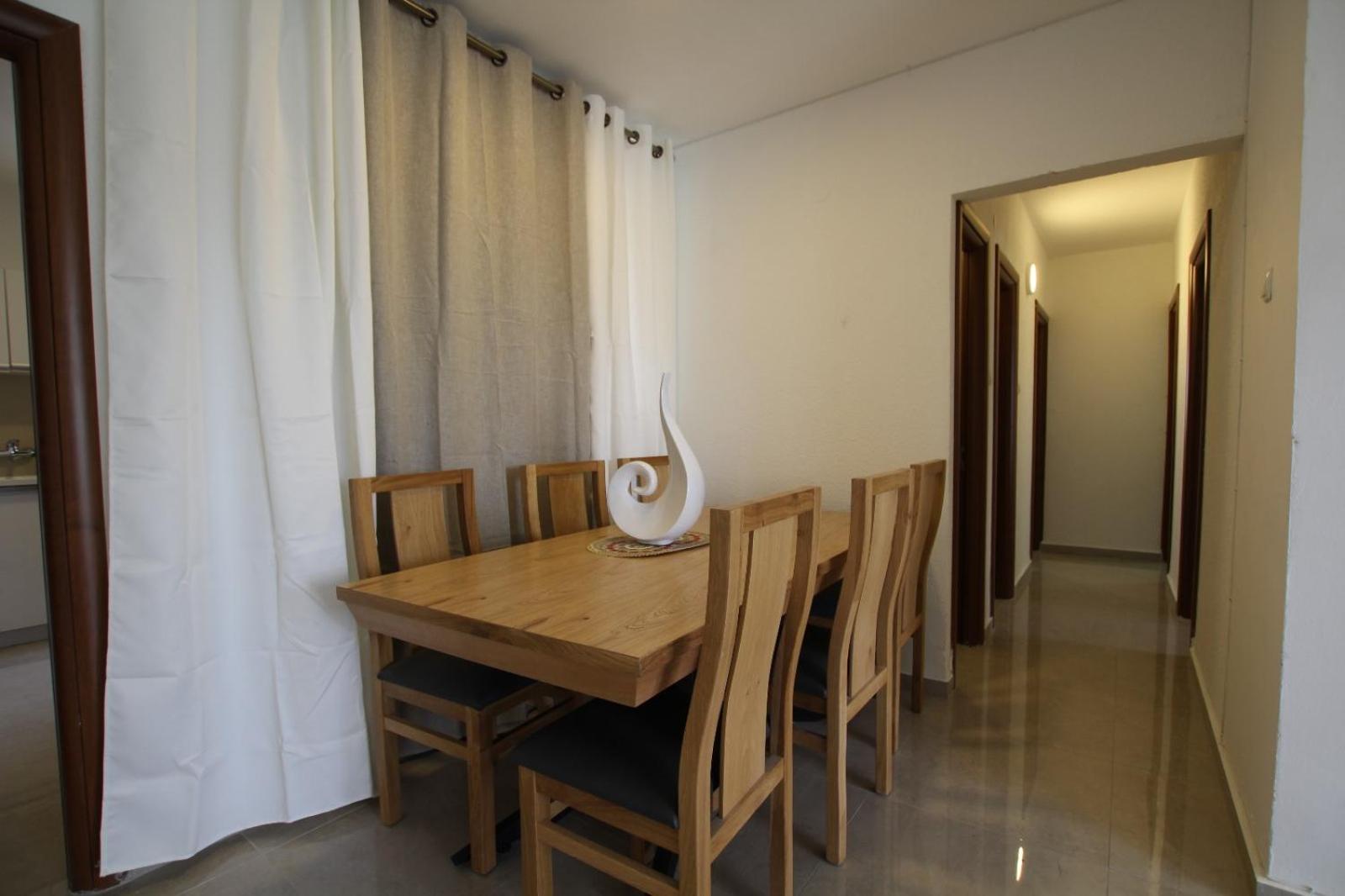 Three-Bedroom Apartment - Photo 11
