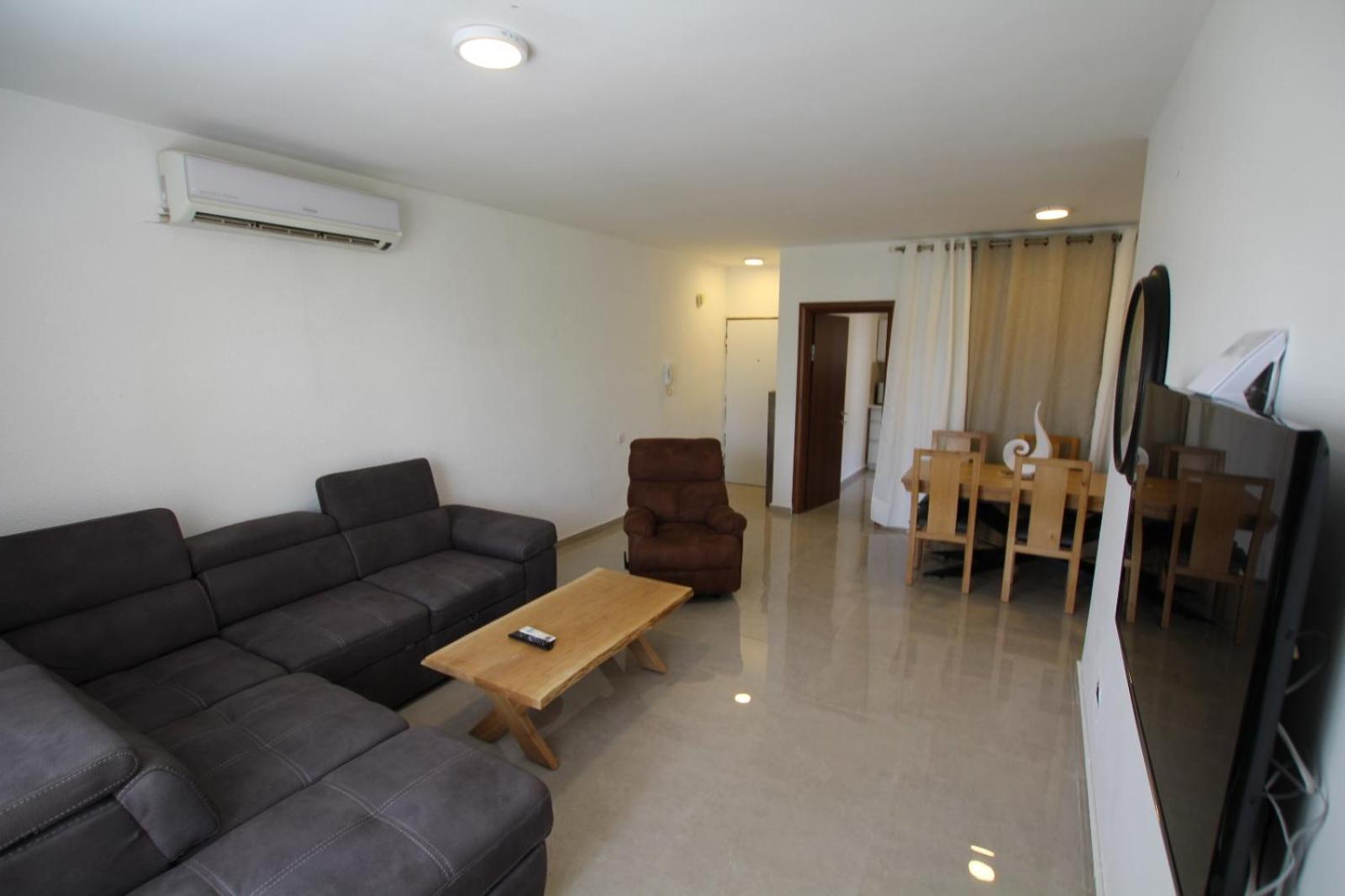 Three-Bedroom Apartment - Photo 16