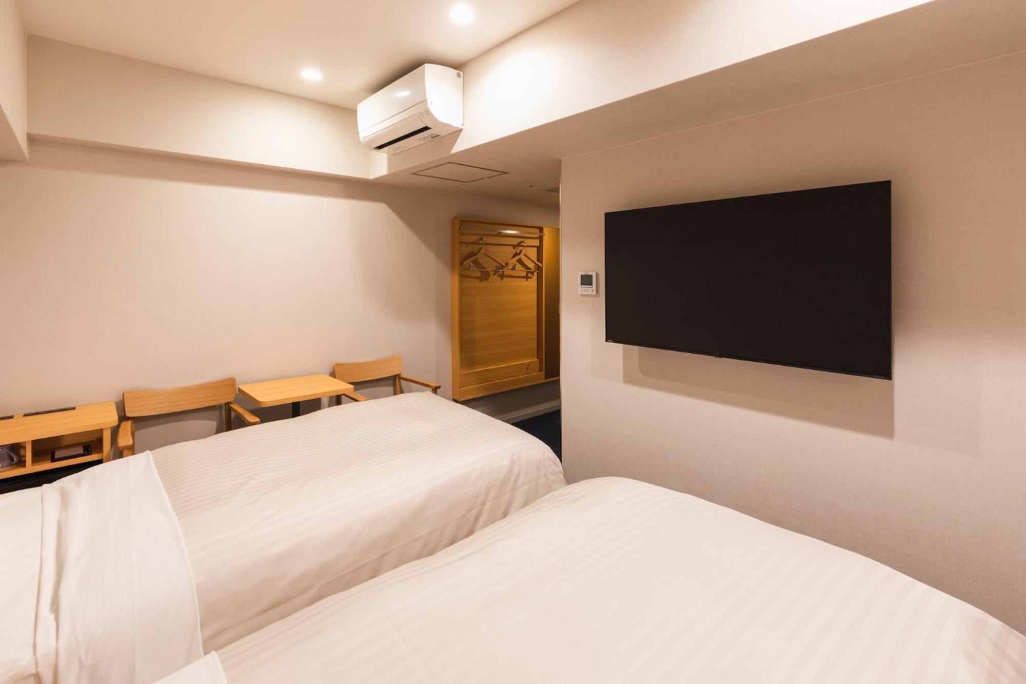 Twin Room - Non-Smoking - Photo 12