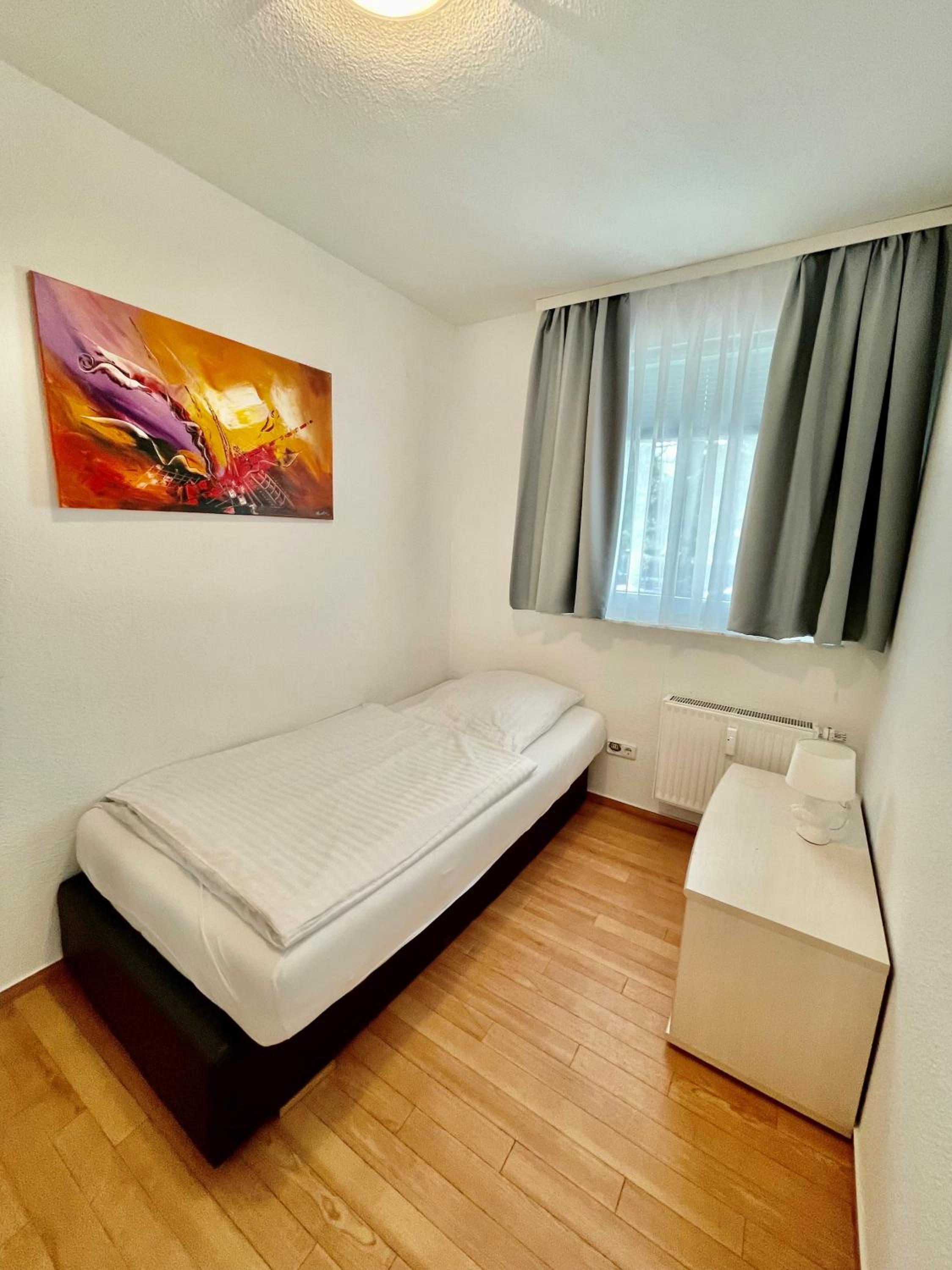 Two-Bedroom Apartment - Photo 11