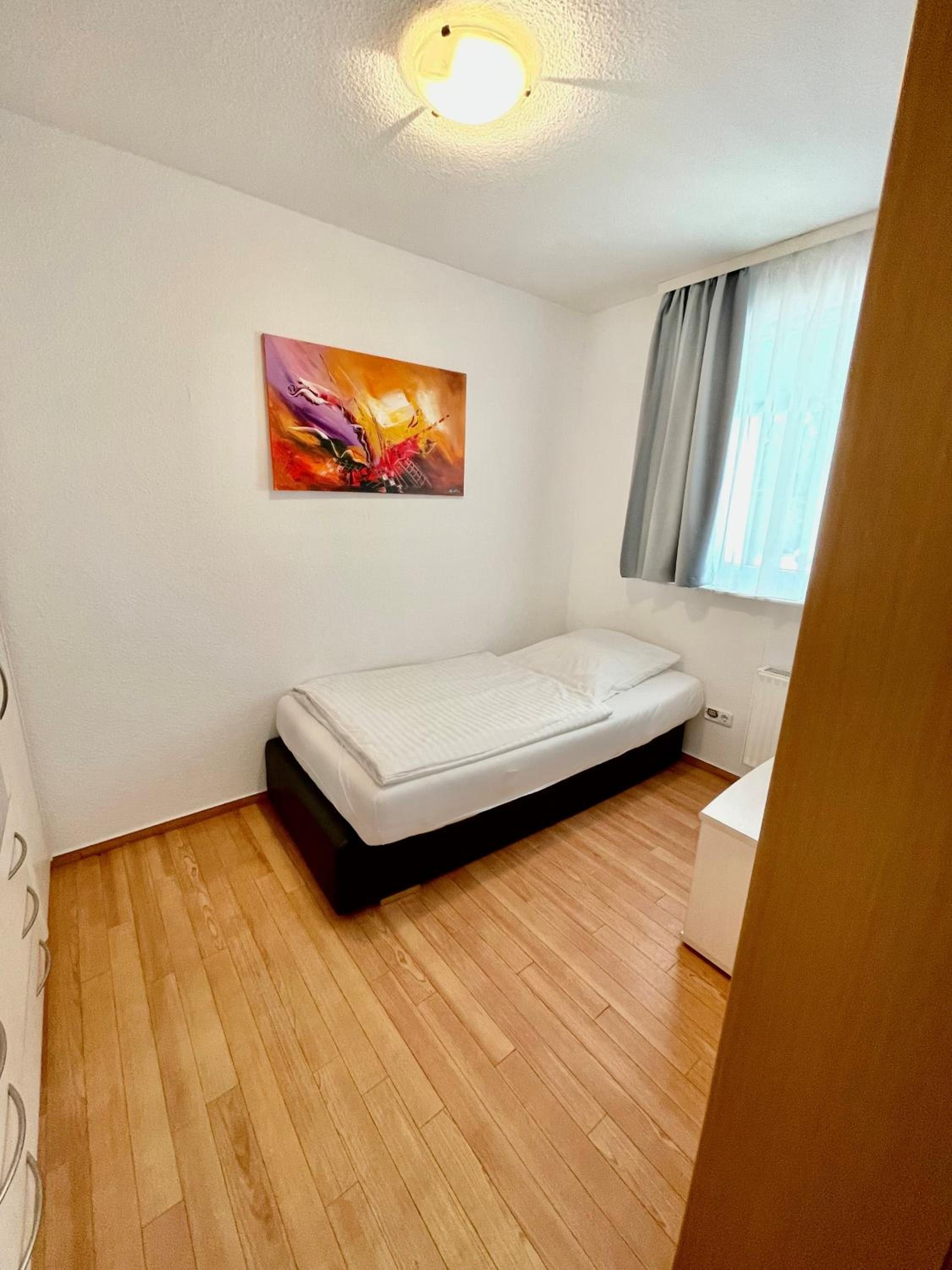 Two-Bedroom Apartment - Photo 12