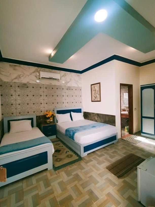 Economy Triple Room - Photo 3