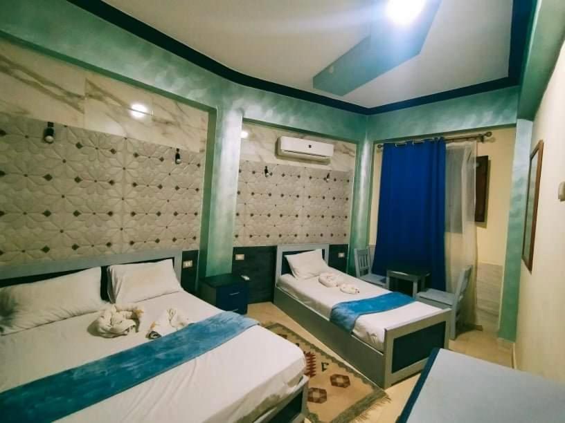 Economy Triple Room - Photo 5