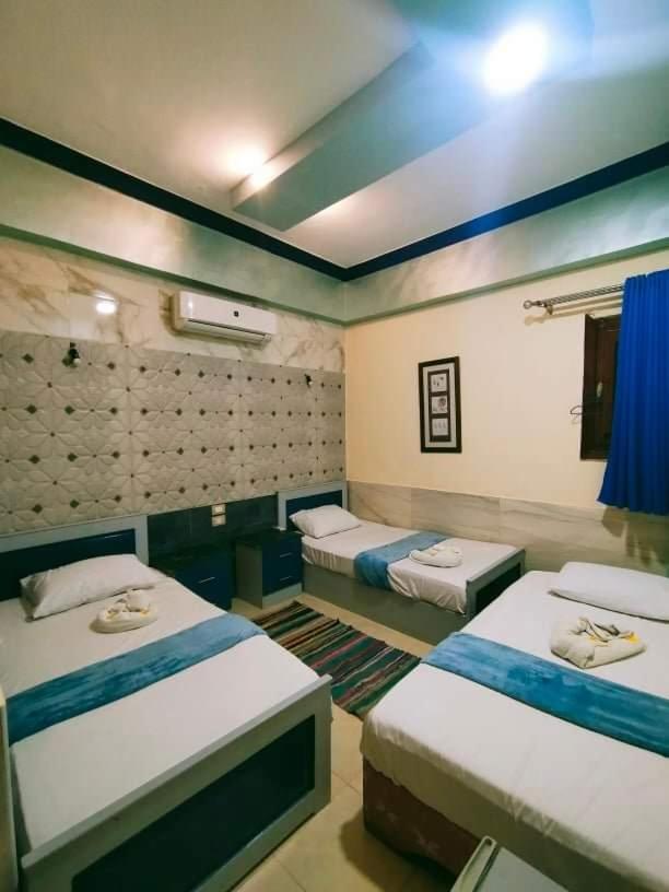 Economy Quadruple Room - Photo 5