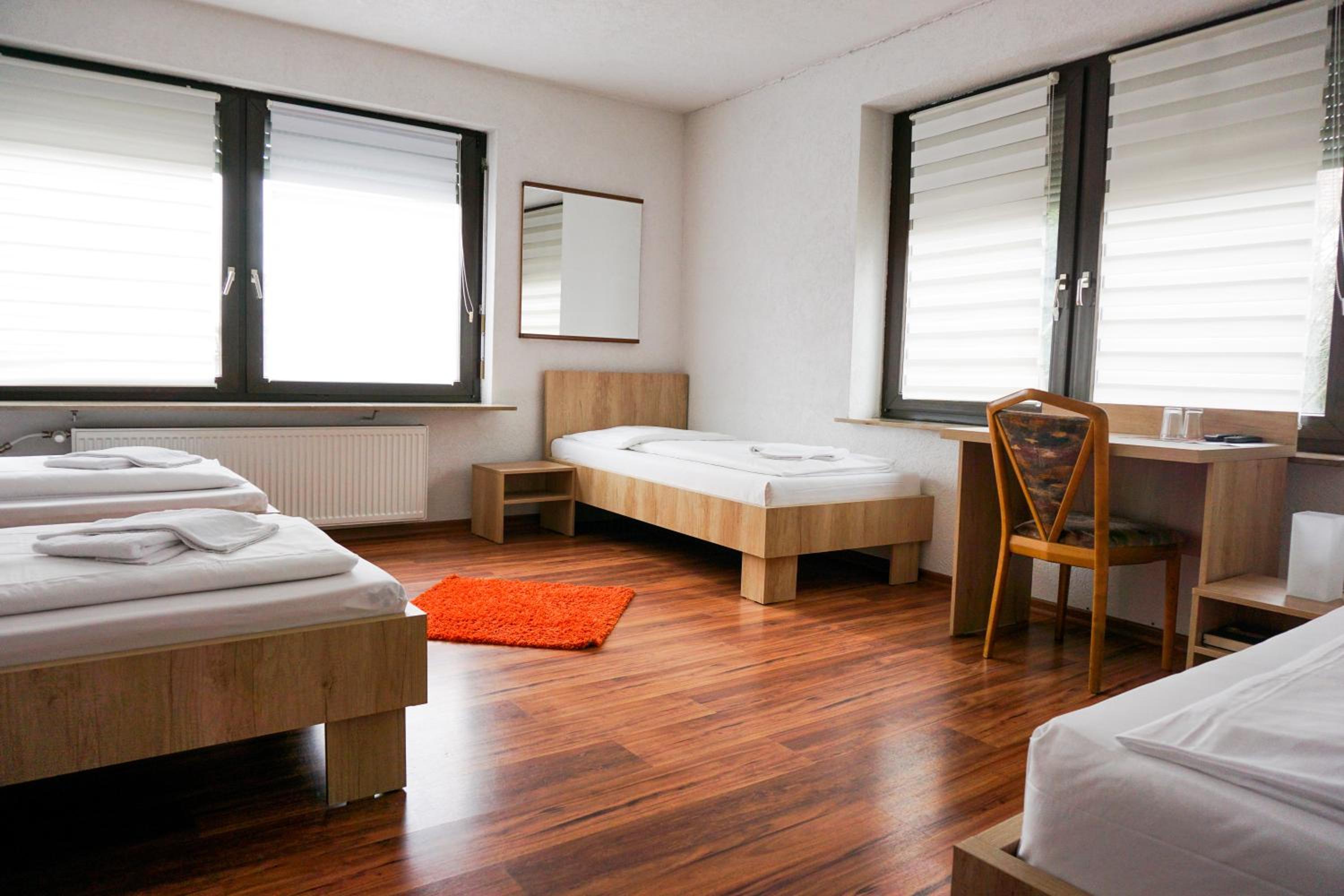 Quadruple Room with Private External Bathroom - Photo 1