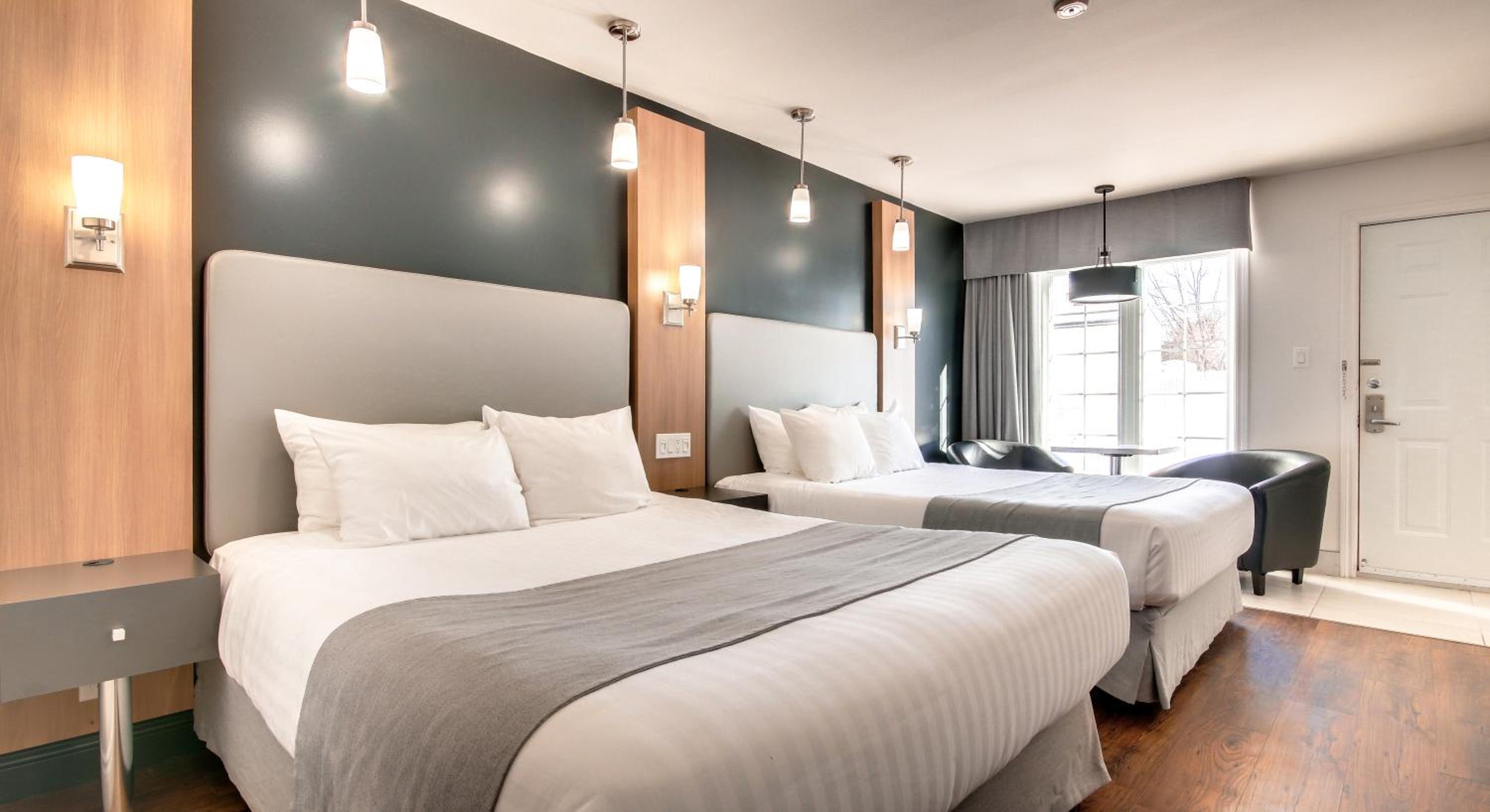 Deluxe Queen Room with Two Queen Beds photo 1