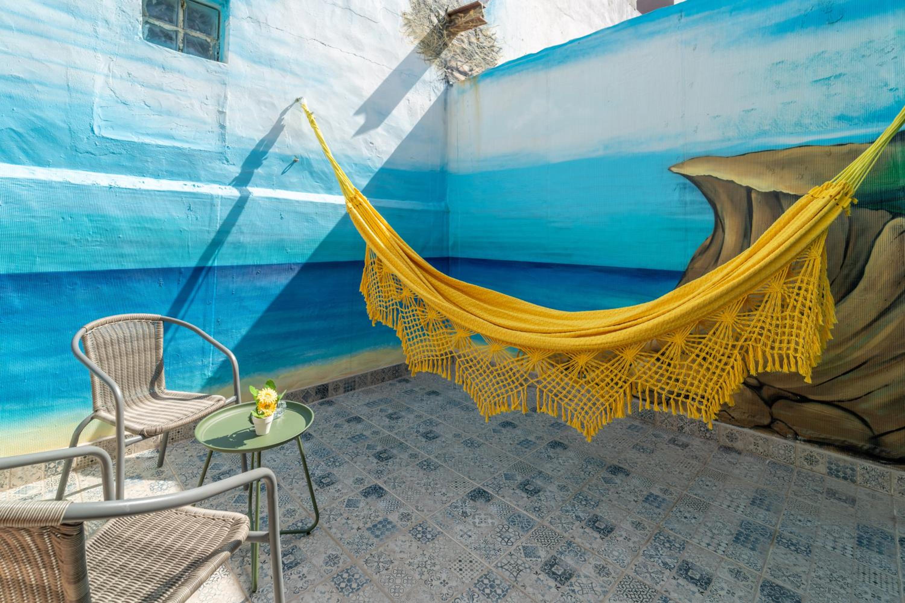 One-Bedroom Apartment with Patio - Photo 16
