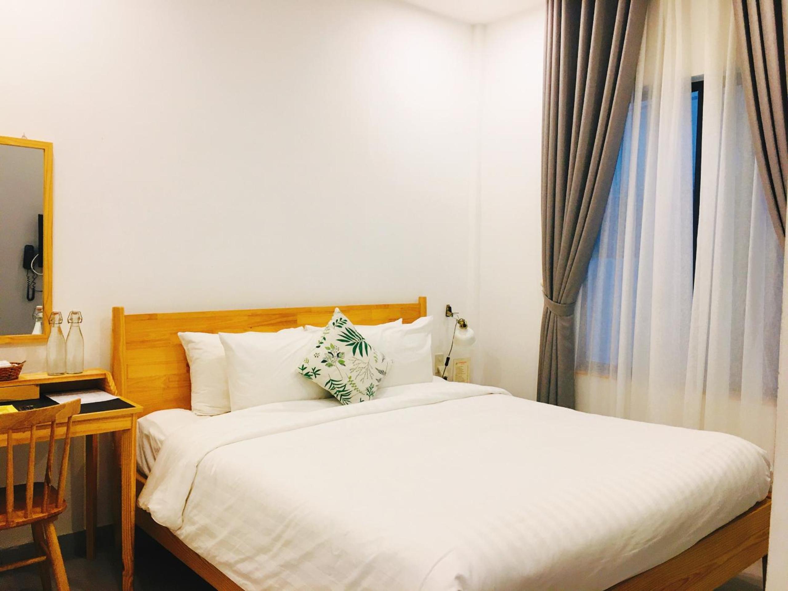 Deluxe Room - Photo 5