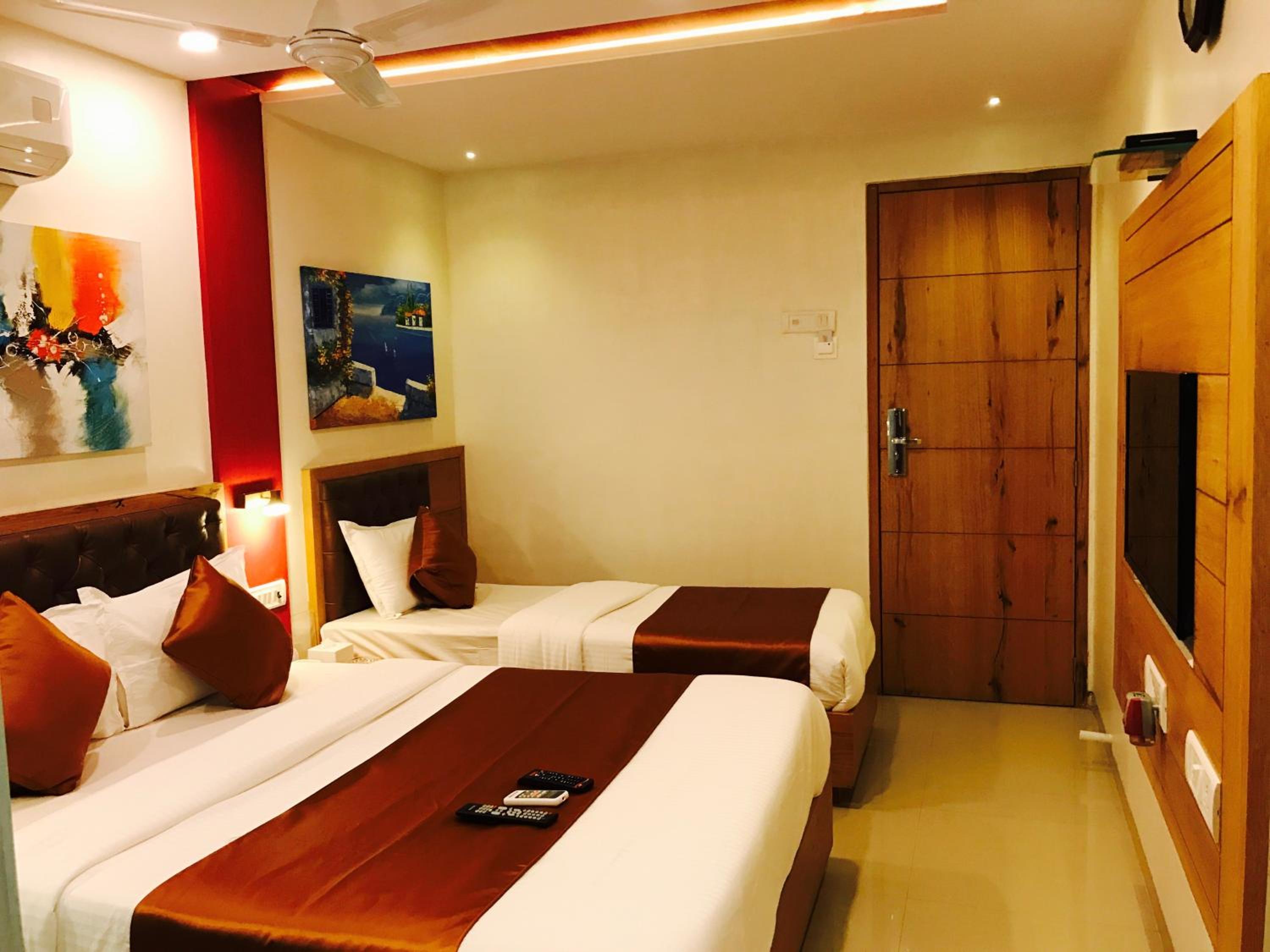 Deluxe Triple Room - Photo 8