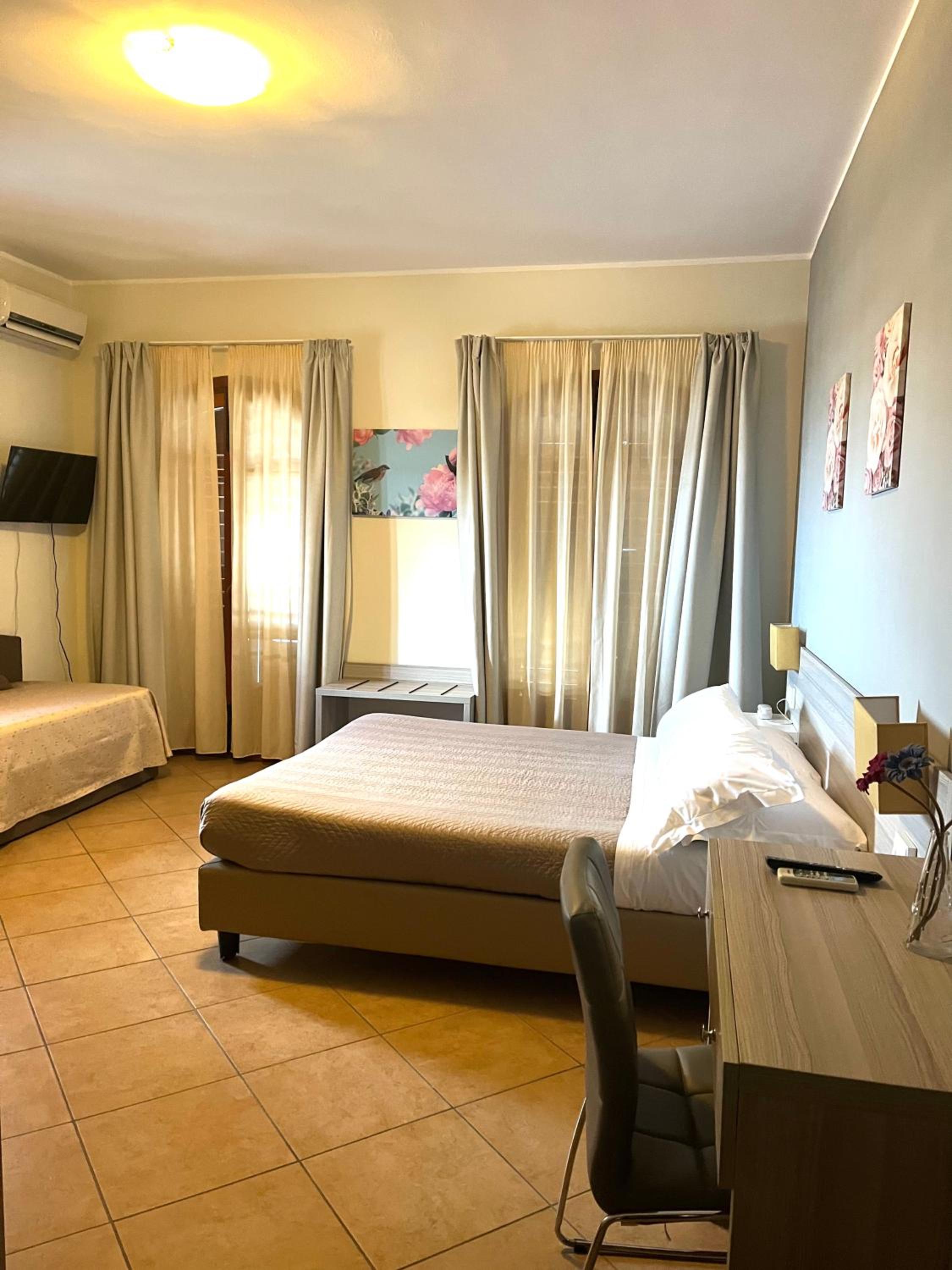 Chambre Quadruple avec Balcon 