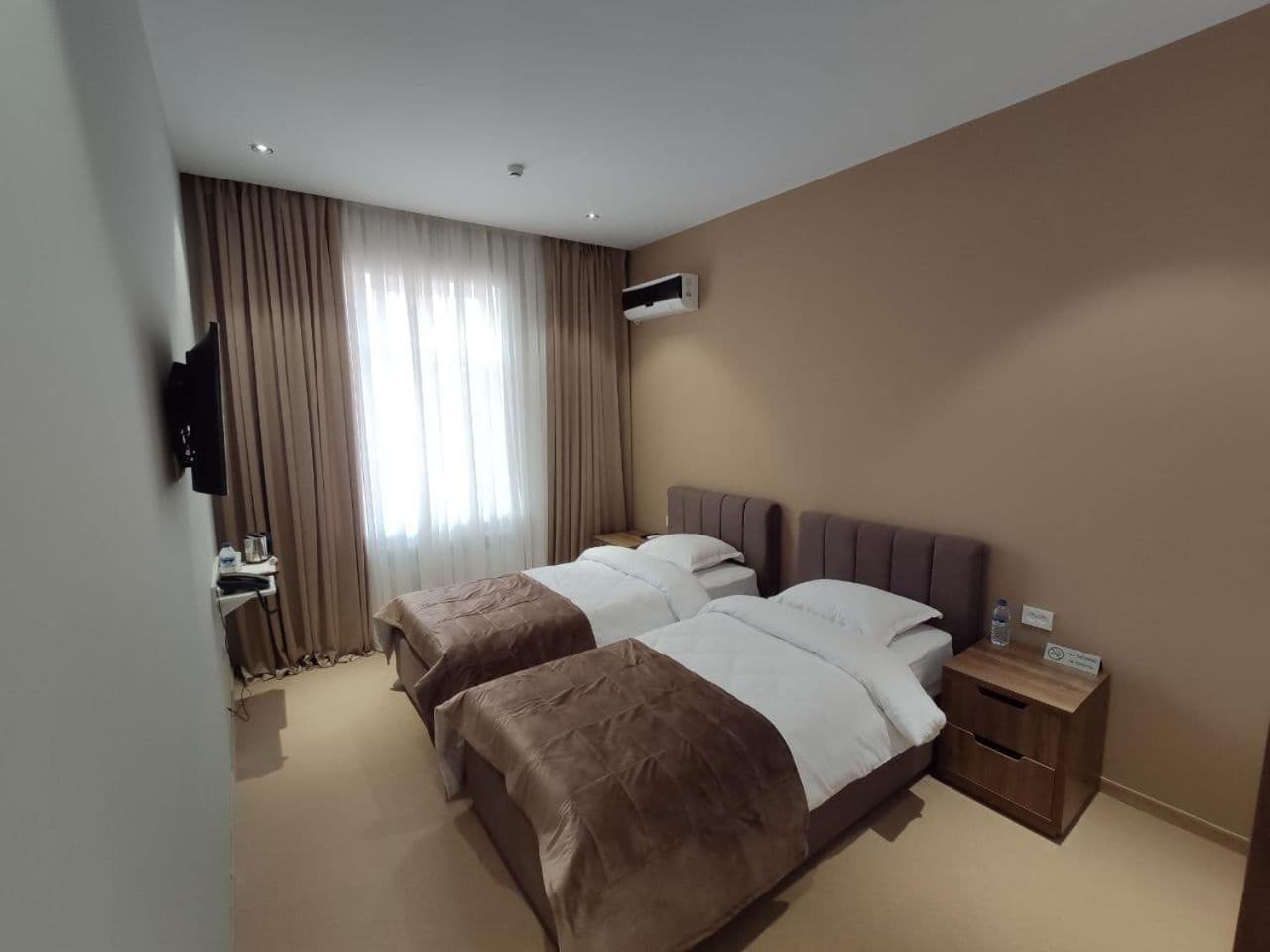 Standard Twin Room - Photo 16
