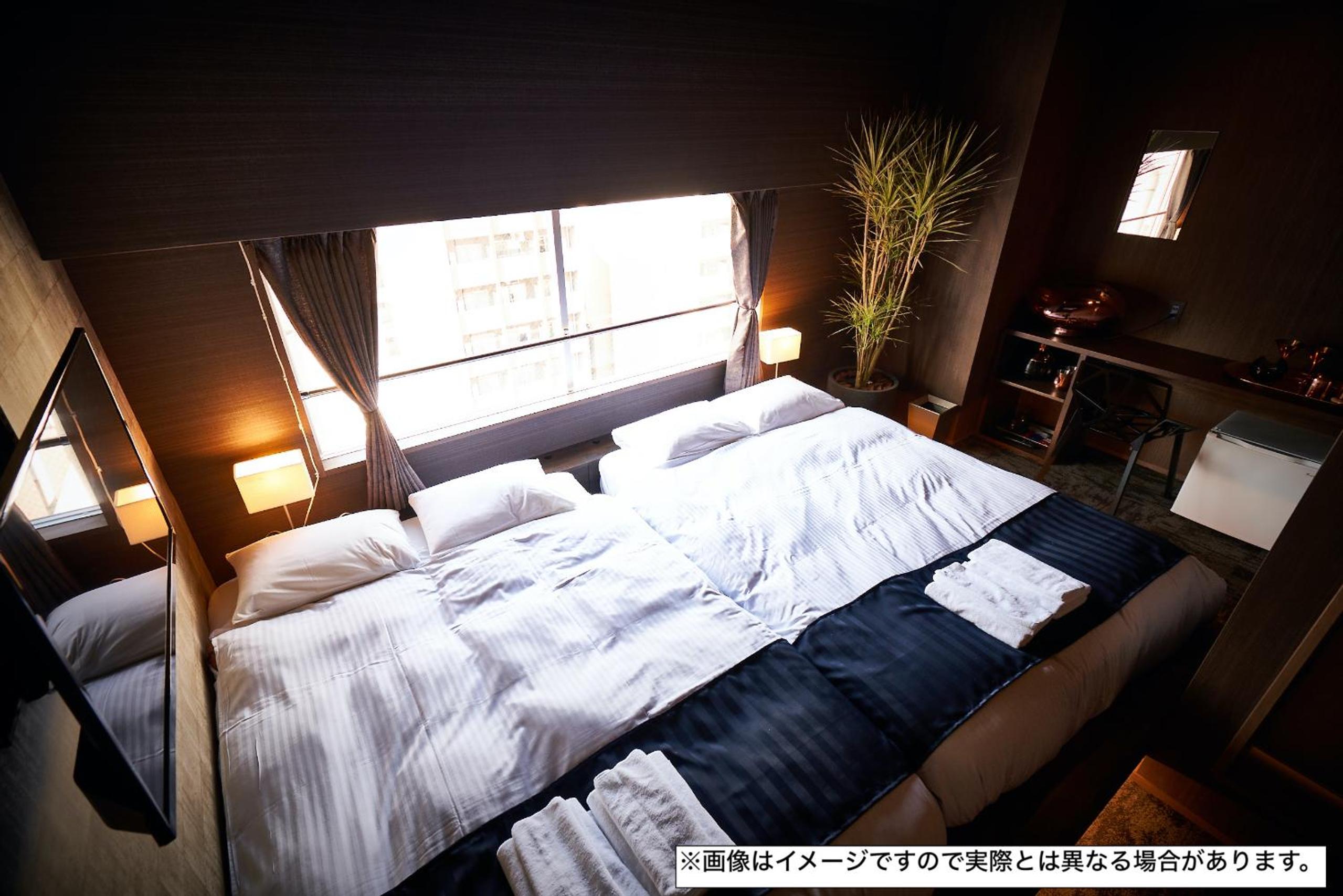 Quadruple Room with Private Bathroom