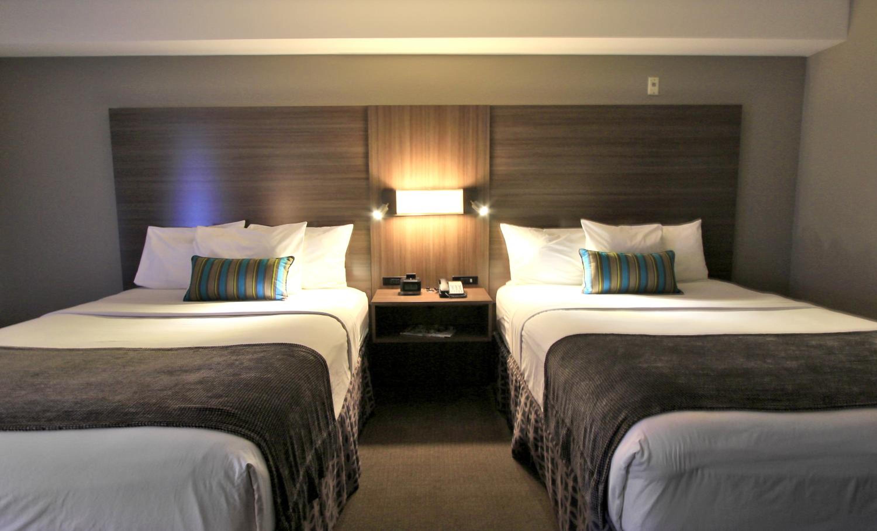 Double Queen Room with City View - Photo 6
