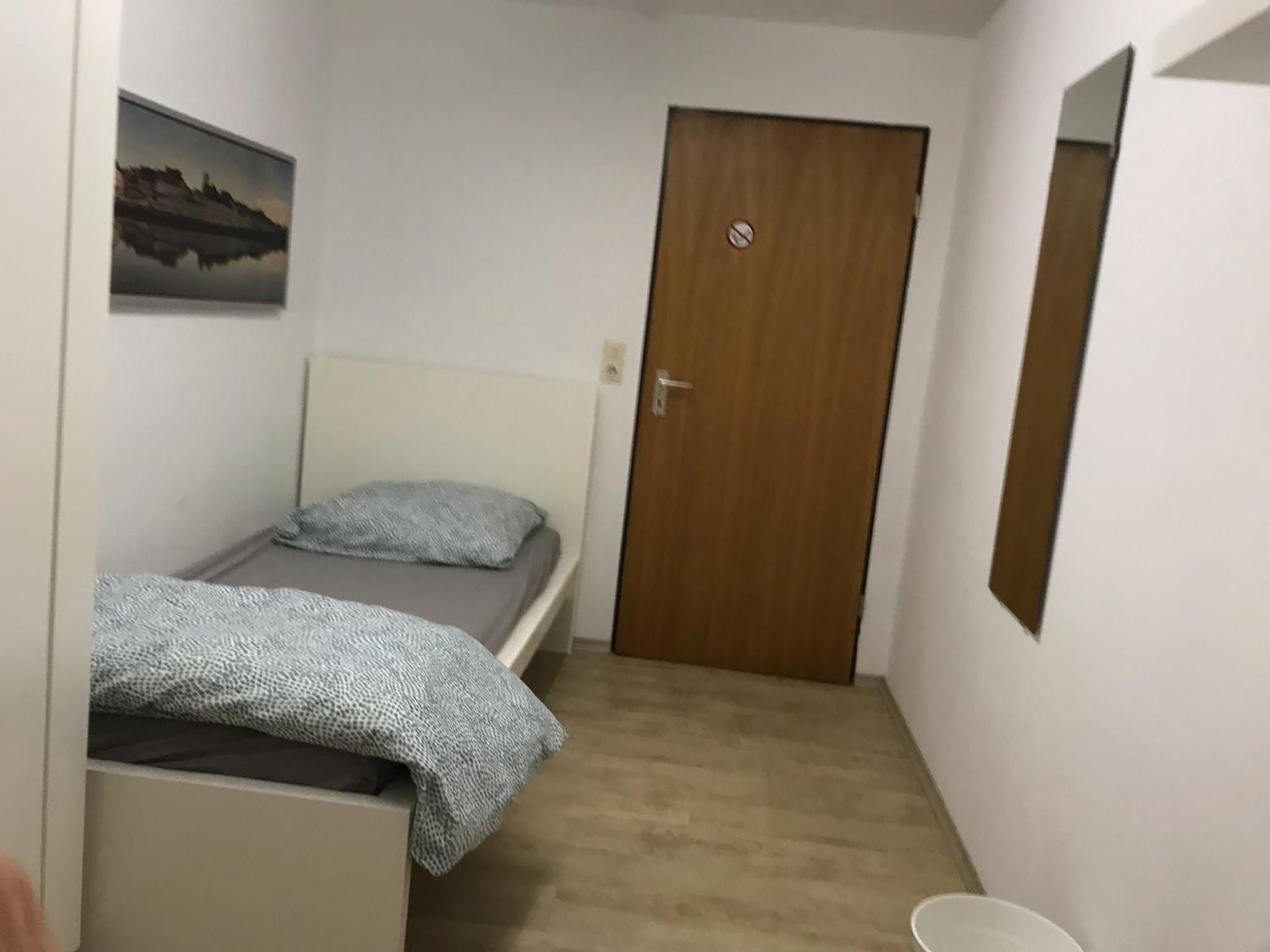 Single Room with Shared Shower and Toilet