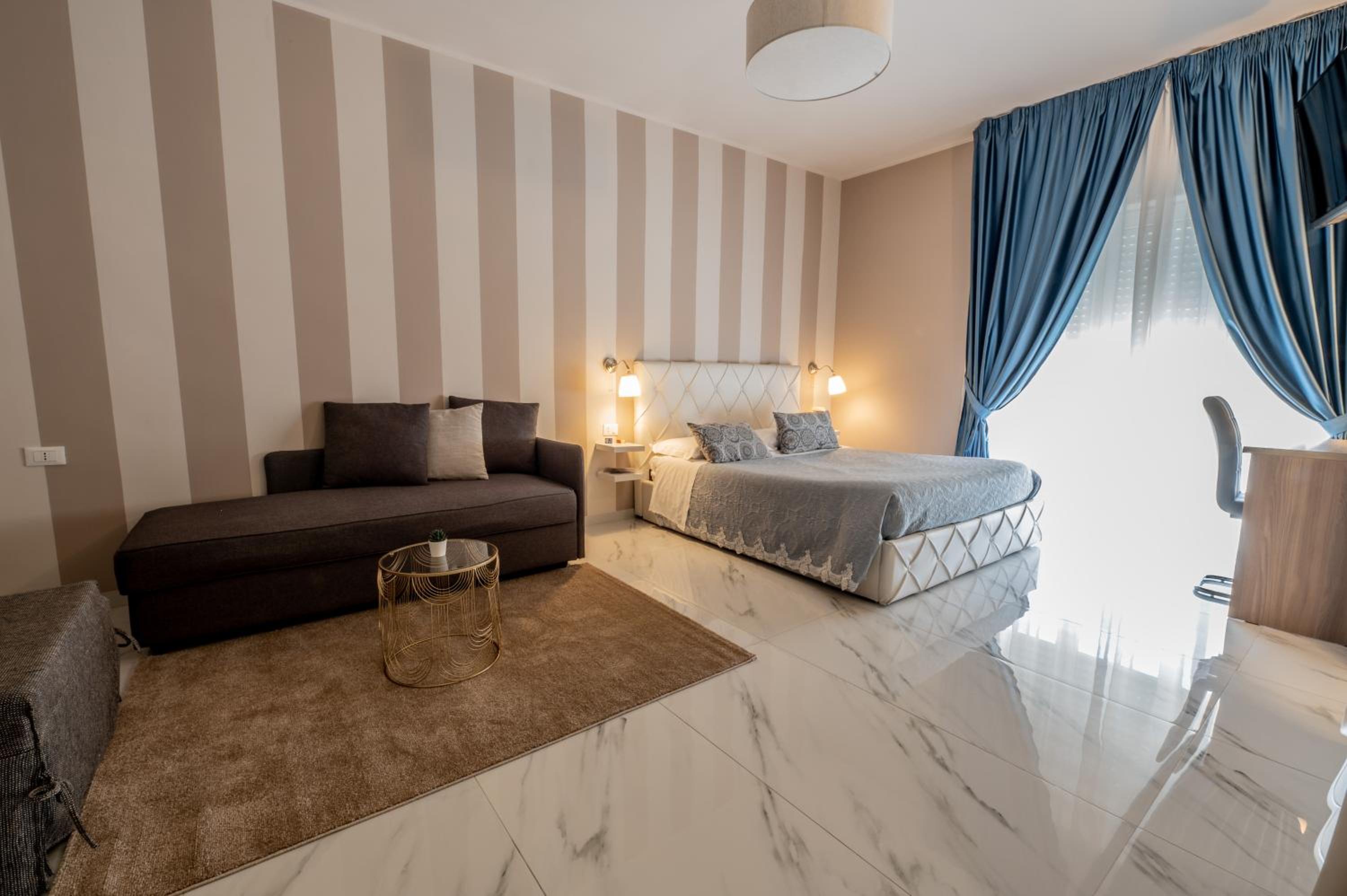 King Suite with Balcony - Photo 1