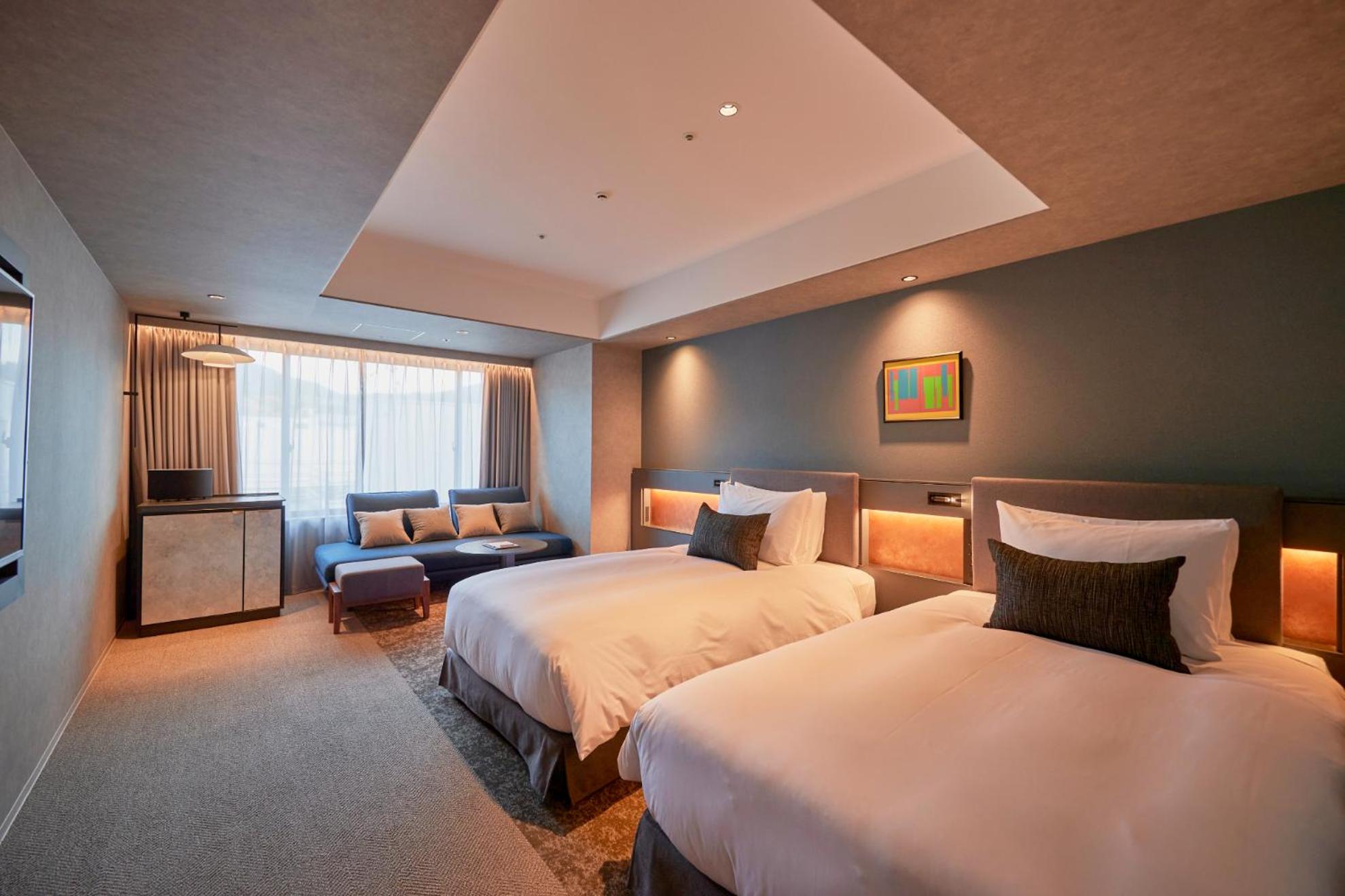 Deluxe Twin Room - Photo 2