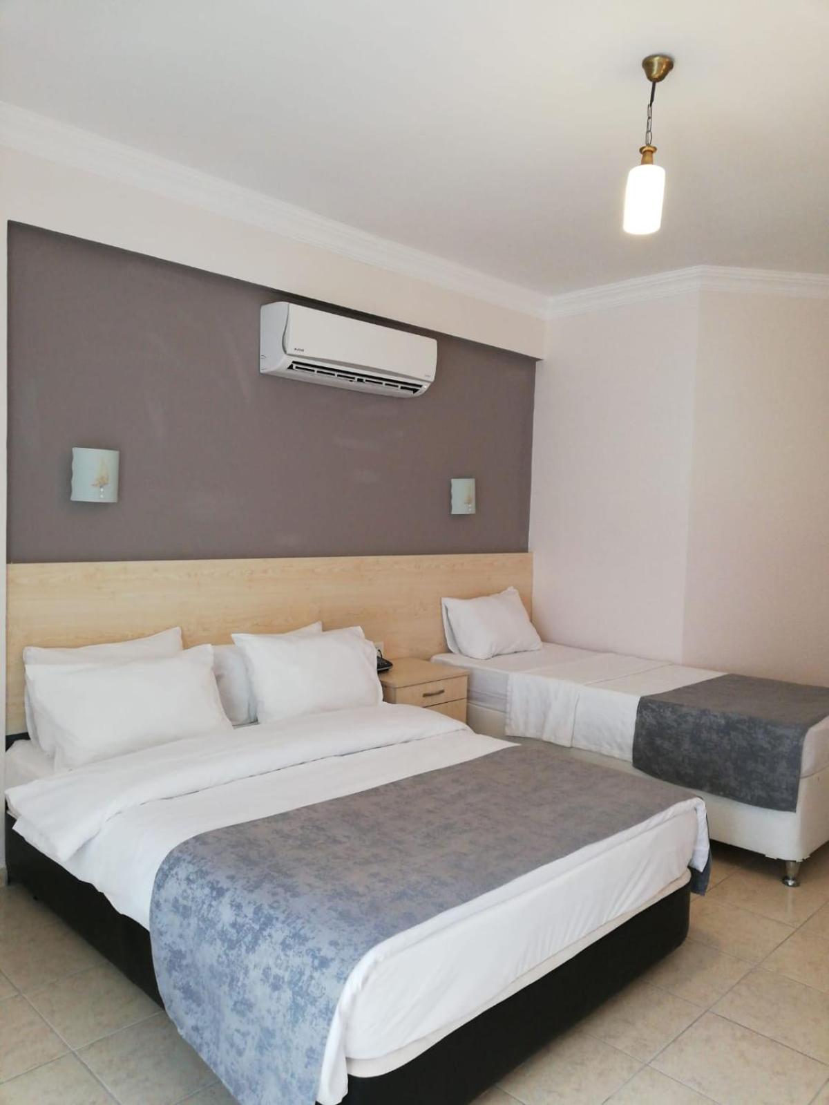Triple Room - Photo 1